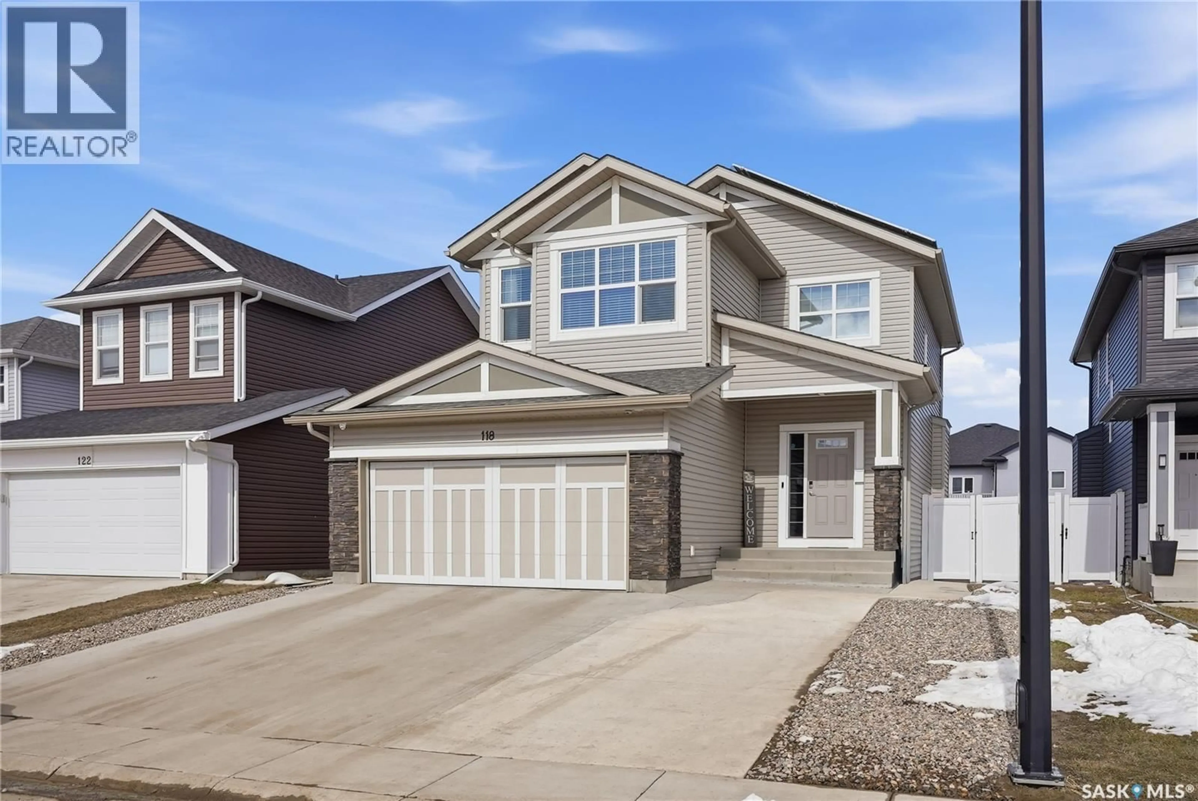 Home with vinyl exterior material, street for 118 STROMBERG CRESCENT, Saskatoon Saskatchewan S7L6M9