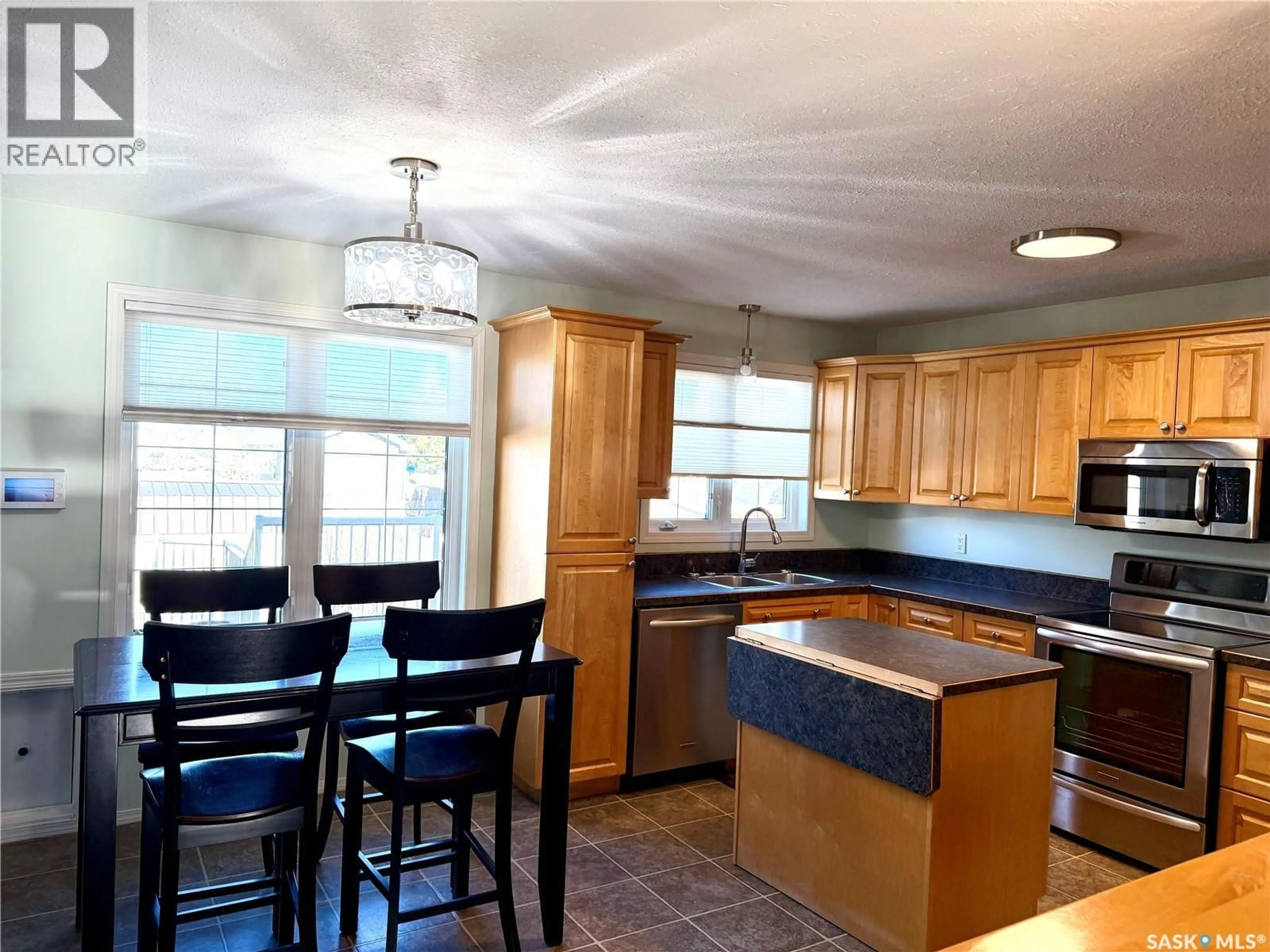 Open concept kitchen, ceramic/tile floor for 135 MEMORIAL DRIVE, Spiritwood Saskatchewan S0J2M0