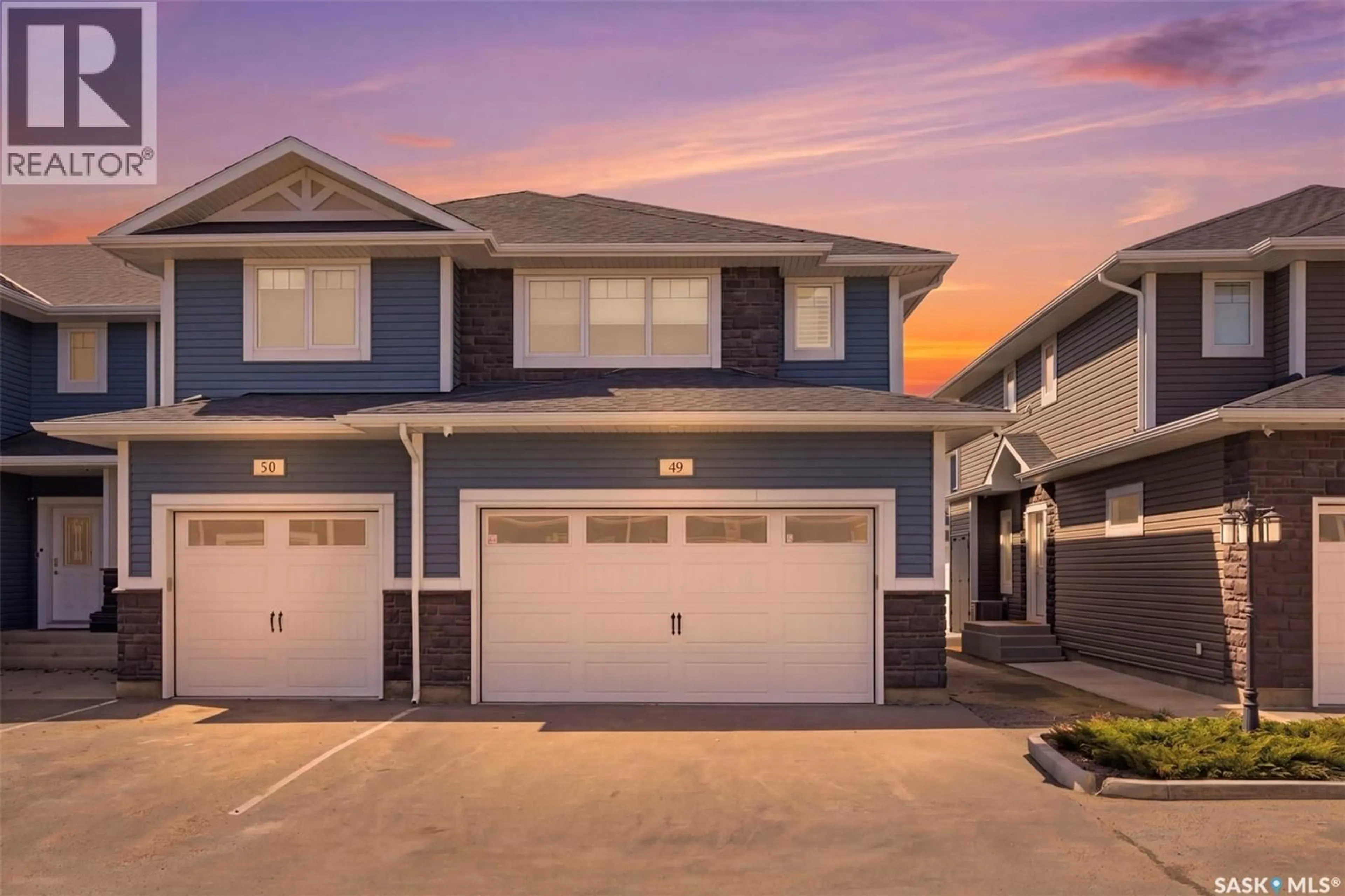 Home with vinyl exterior material, street for 49 115 VELTKAMP CRESCENT, Saskatoon Saskatchewan S7T0T7