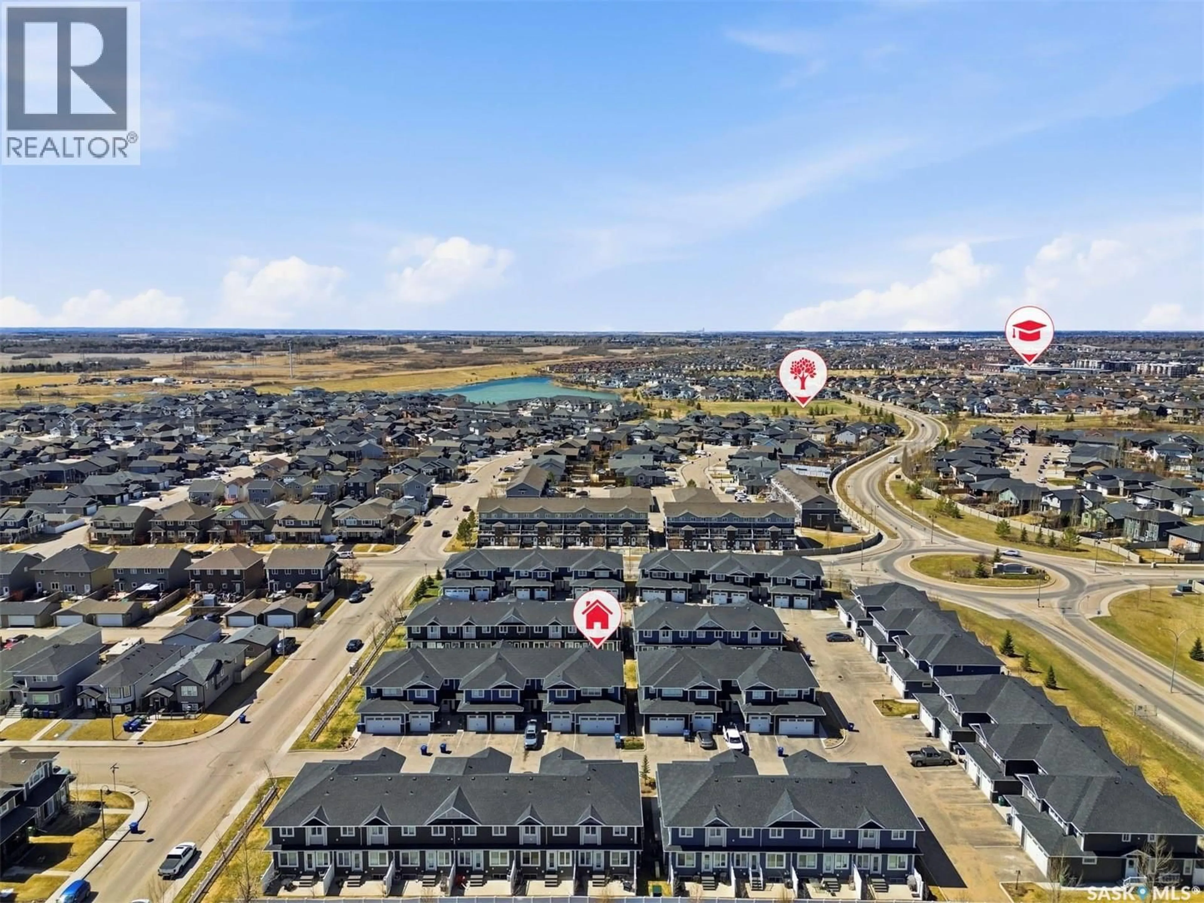 A pic from outside/outdoor area/front of a property/back of a property/a pic from drone, unknown for 49 115 VELTKAMP CRESCENT, Saskatoon Saskatchewan S7T0T7