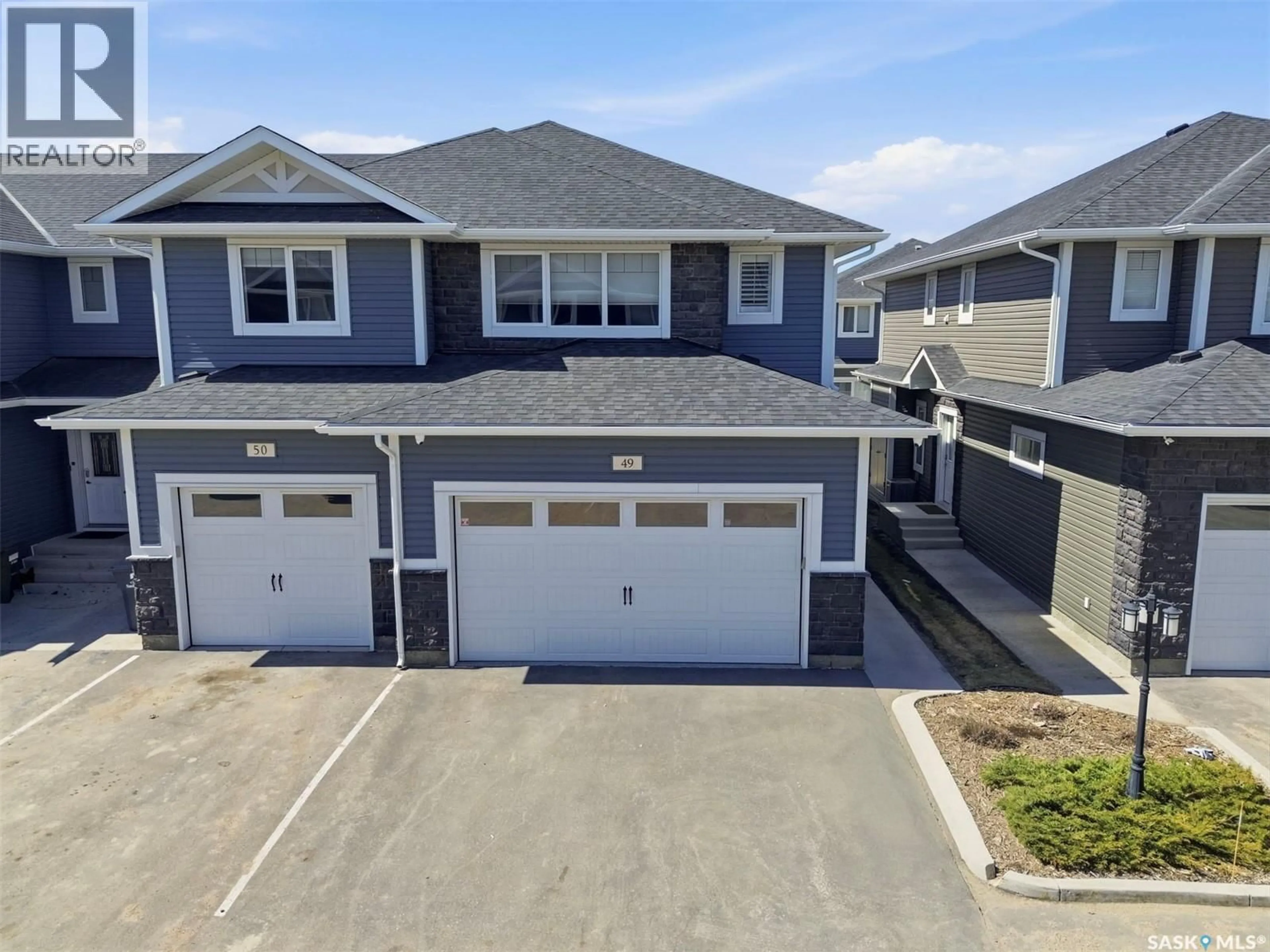 A pic from outside/outdoor area/front of a property/back of a property/a pic from drone, street for 49 115 VELTKAMP CRESCENT, Saskatoon Saskatchewan S7T0T7