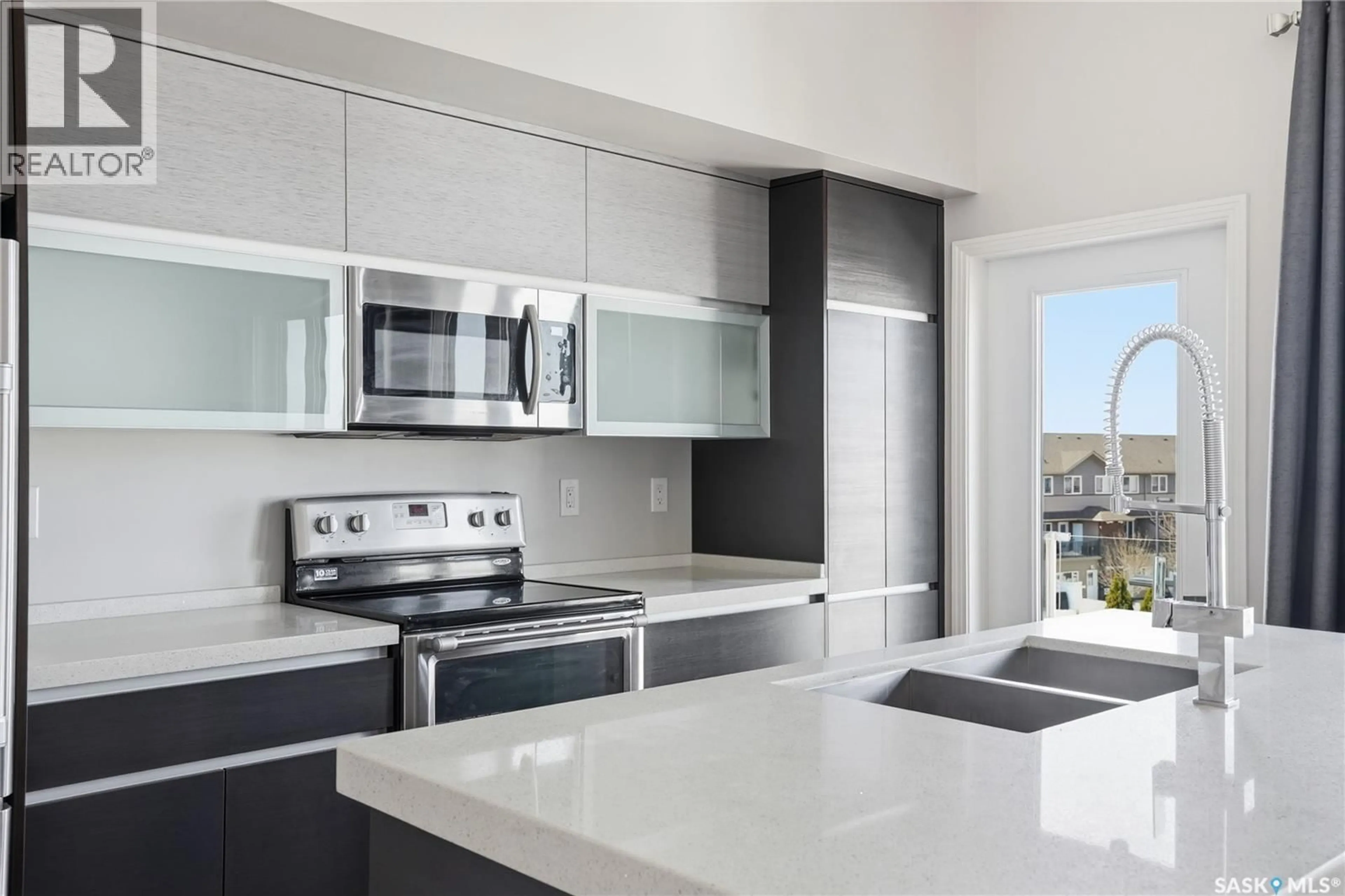 Contemporary kitchen, ceramic/tile floor for 235 - 308 EVERGREEN SQUARE, Saskatoon Saskatchewan S7W0T9