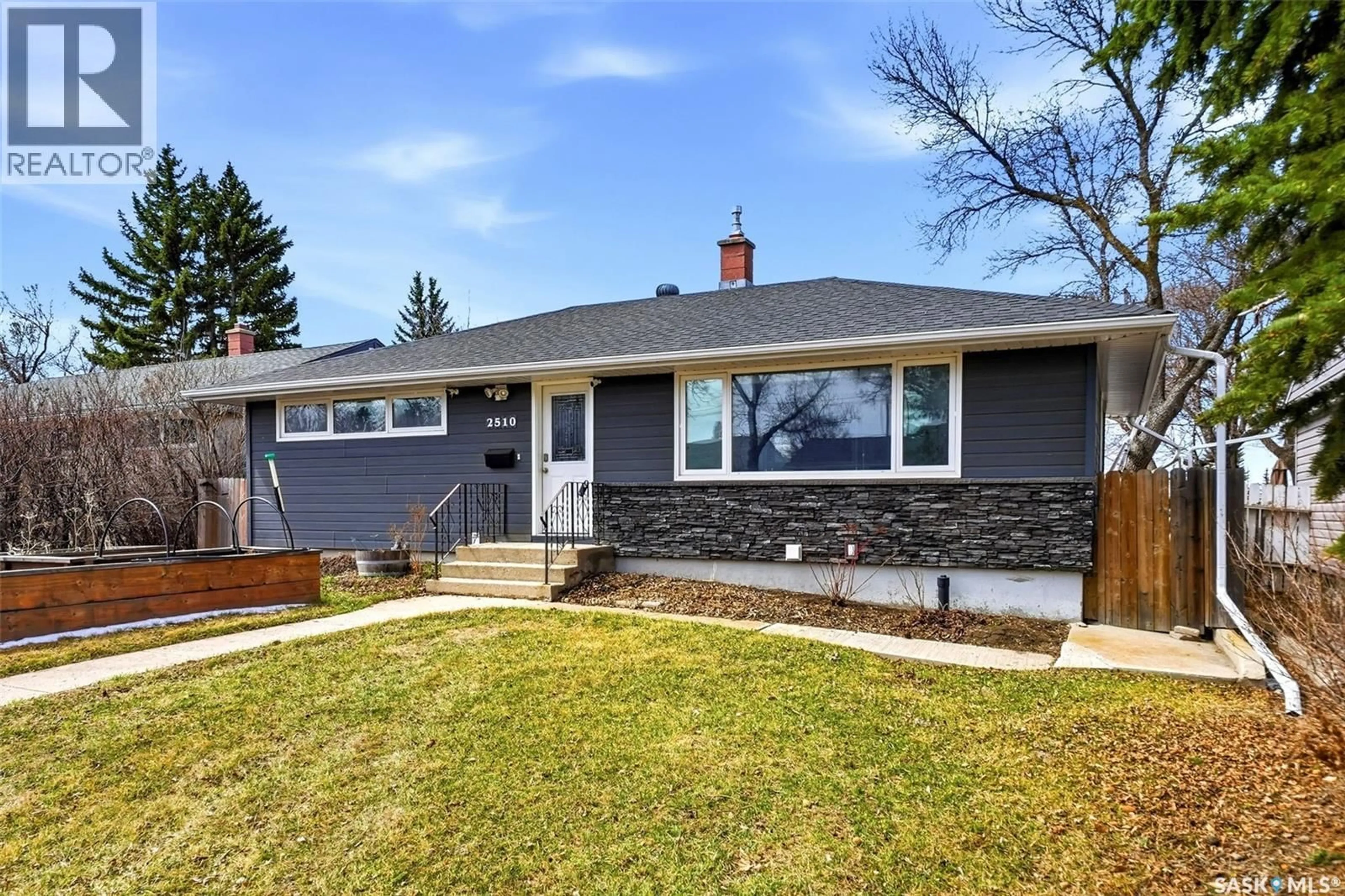 Home with vinyl exterior material, street for 2510 EDWARD STREET, Regina Saskatchewan S4S0M8