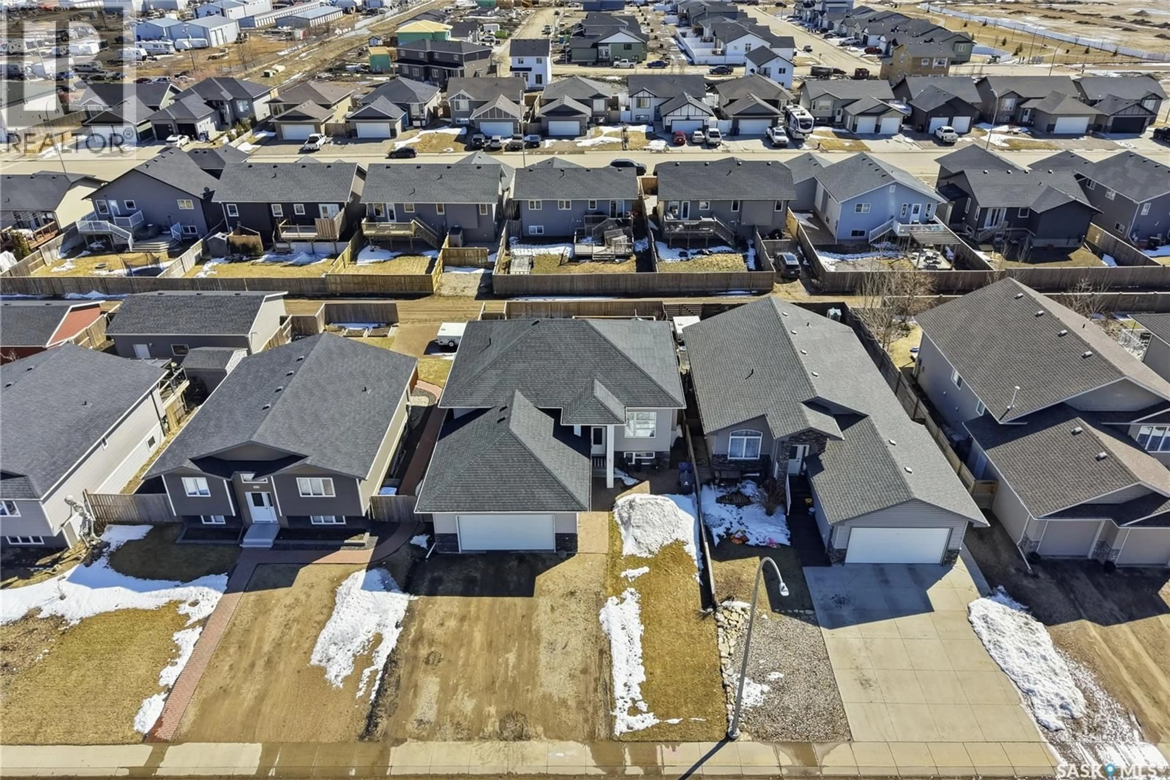A pic from outside/outdoor area/front of a property/back of a property/a pic from drone, street for 311 RIGMOR STREET, Warman Saskatchewan S0K4S3
