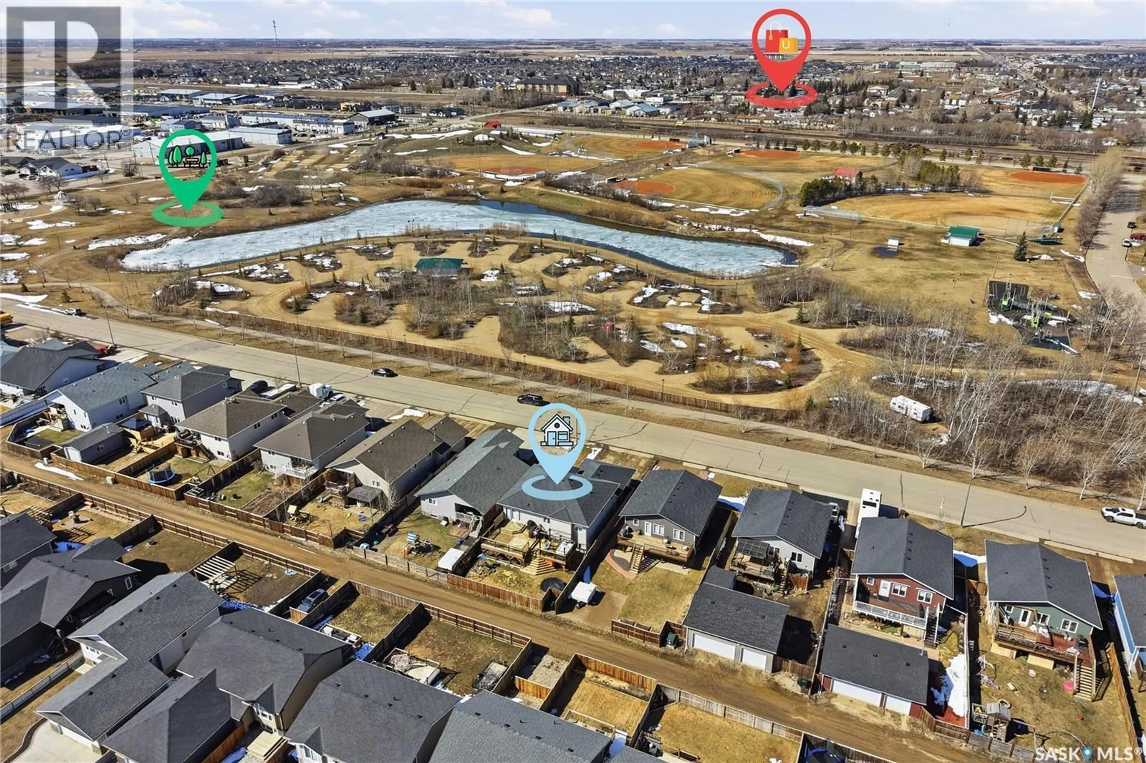 A pic from outside/outdoor area/front of a property/back of a property/a pic from drone, street for 311 RIGMOR STREET, Warman Saskatchewan S0K4S3