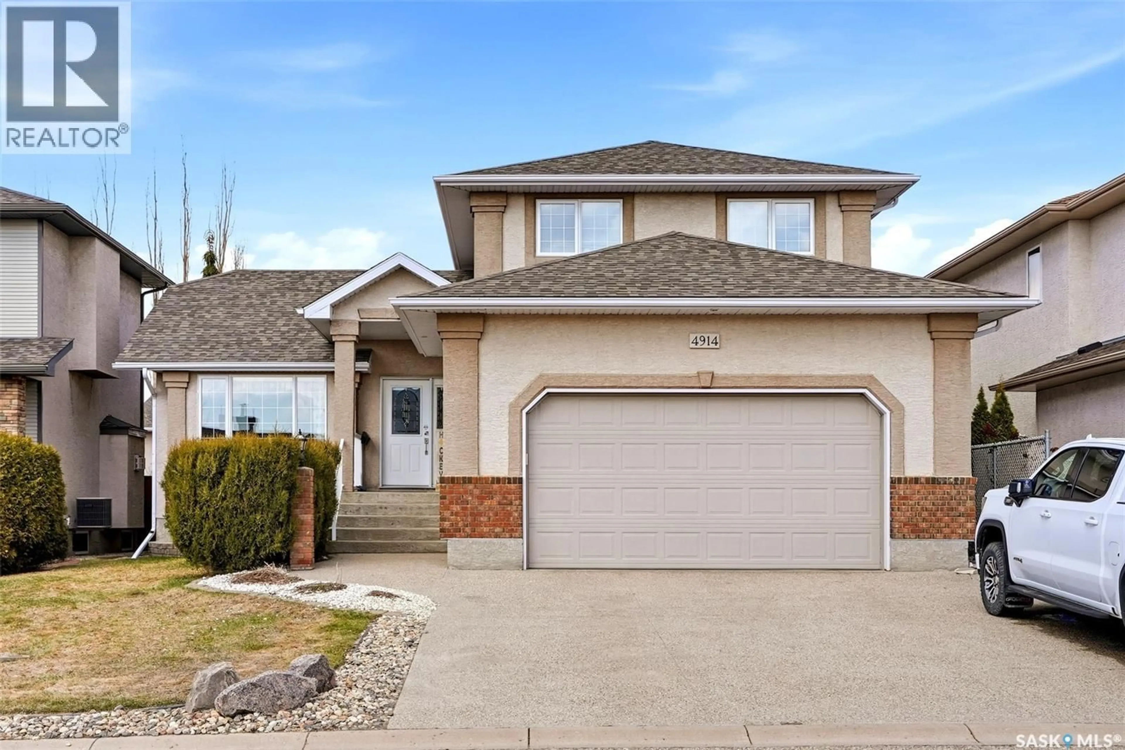 Home with vinyl exterior material, street for 4914 SCHWARTZ WAY, Regina Saskatchewan S4X4R8