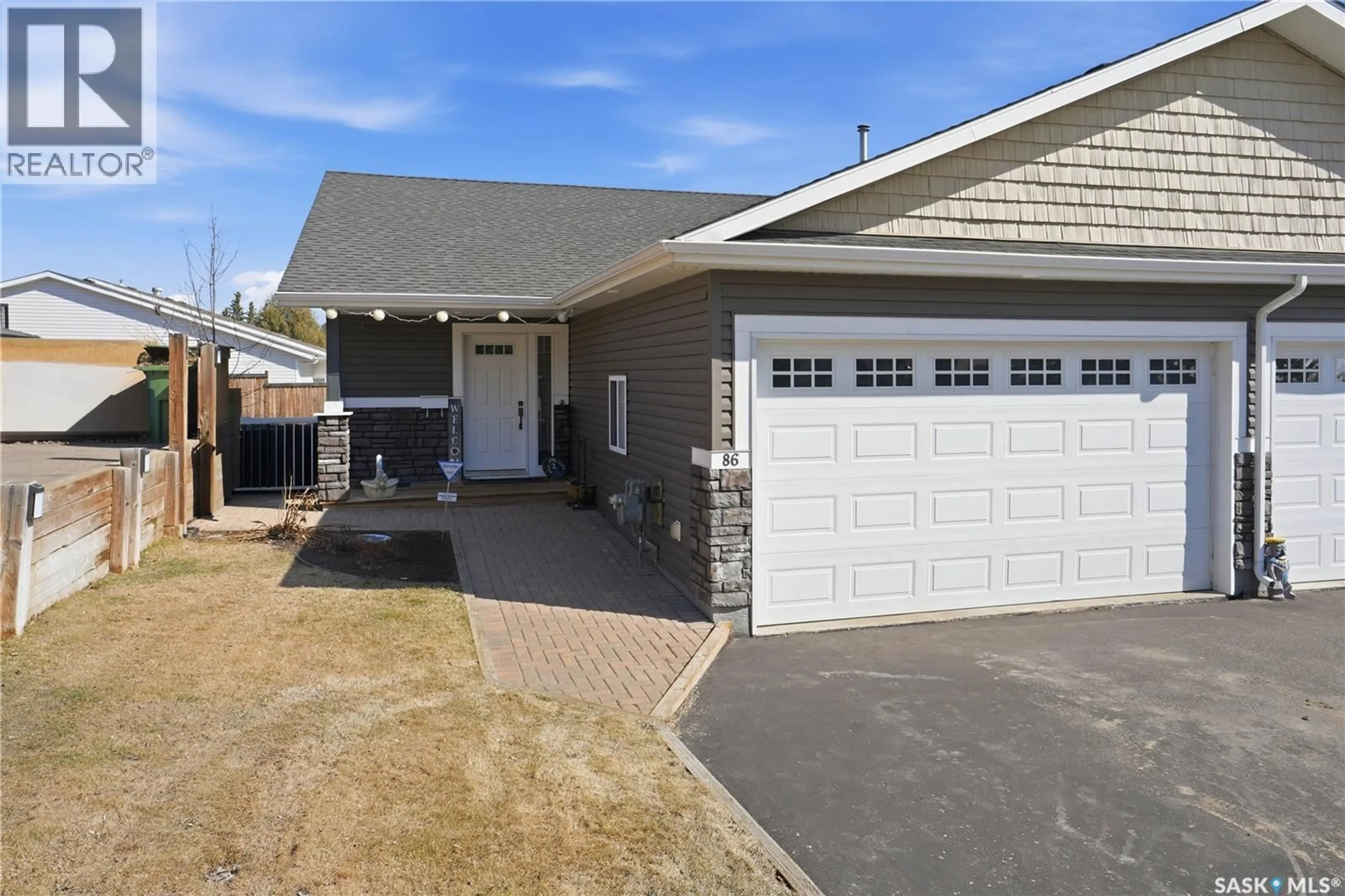 Home with vinyl exterior material, street for 86 28TH STREET, Battleford Saskatchewan S0M0E0