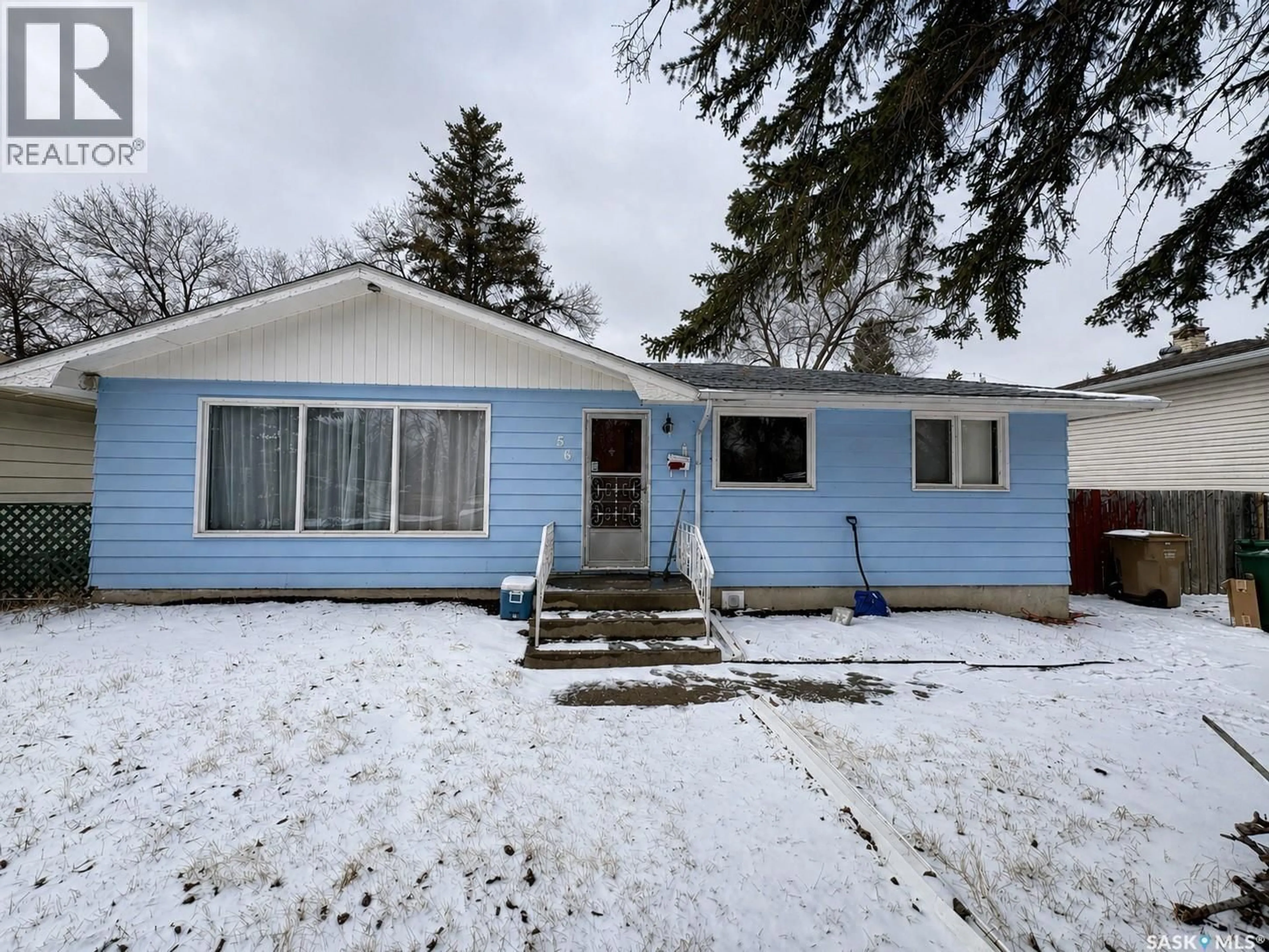 Home with vinyl exterior material, street for 56 MARSH CRESCENT, Regina Saskatchewan S4S5R5