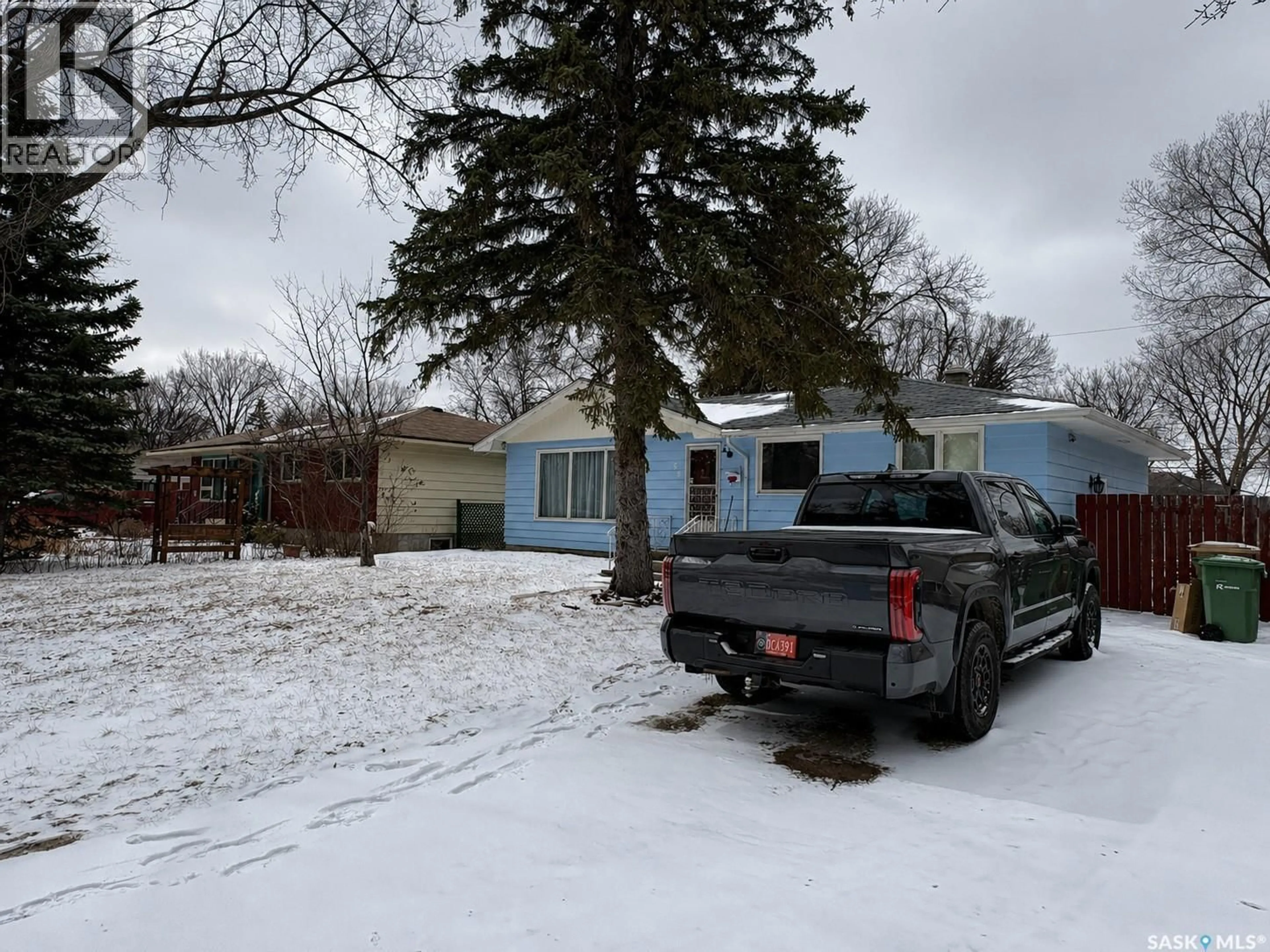 A pic from outside/outdoor area/front of a property/back of a property/a pic from drone, street for 56 MARSH CRESCENT, Regina Saskatchewan S4S5R5