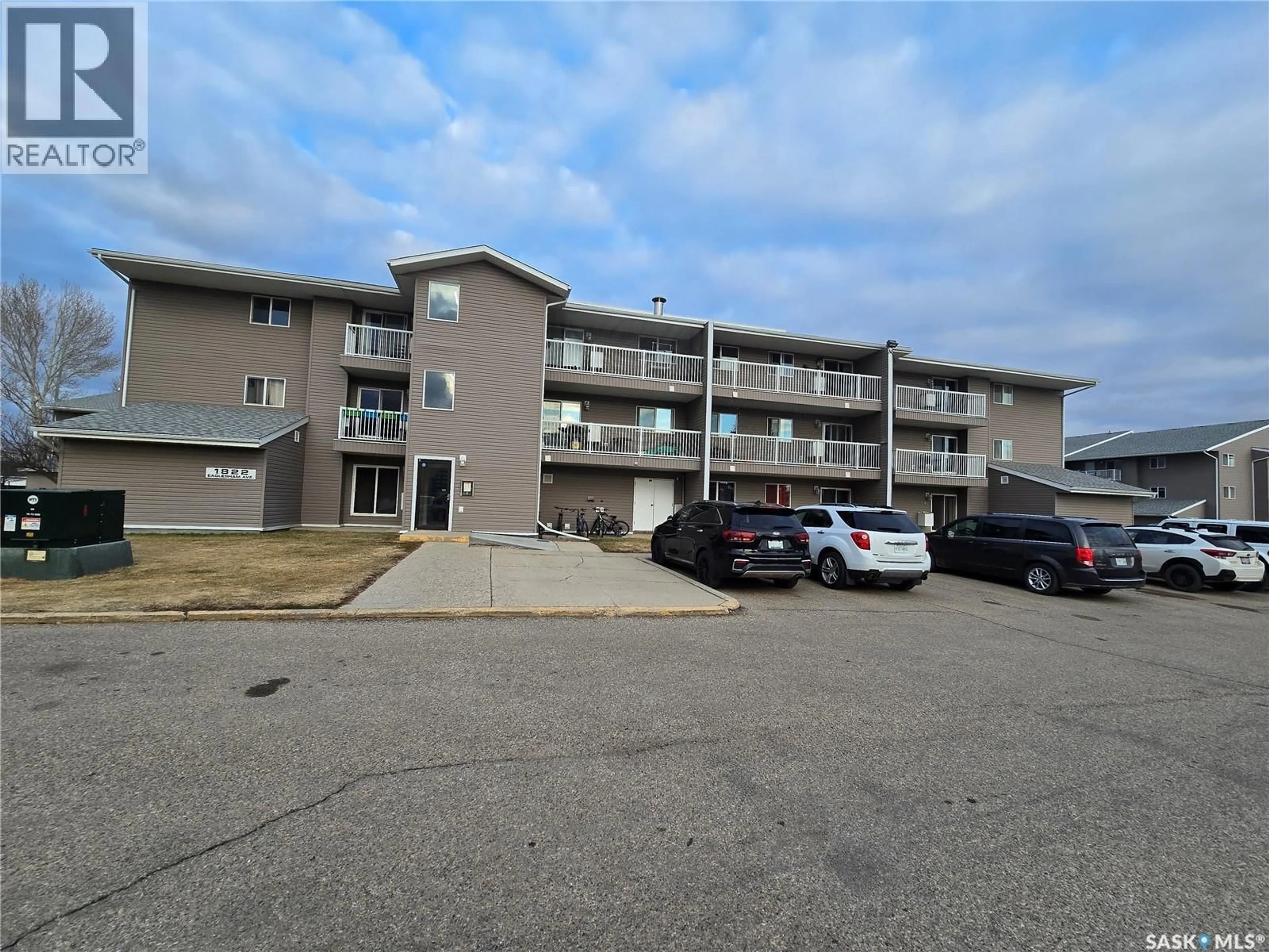 A pic from outside/outdoor area/front of a property/back of a property/a pic from drone, building for 301 - 1822 EAGLESHAM AVENUE, Weyburn Saskatchewan S4H3A8