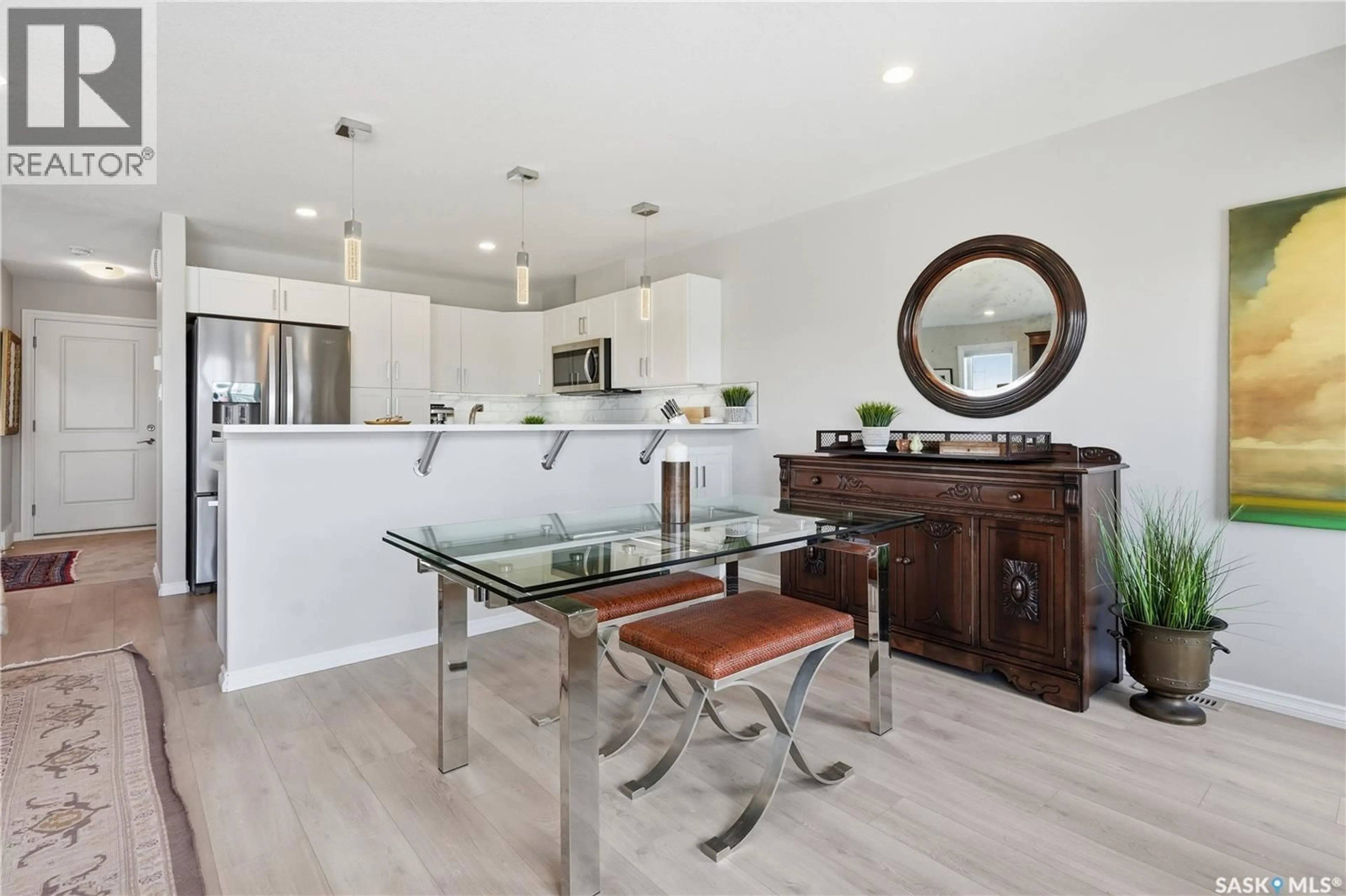 Open concept kitchen, wood/laminate floor for 4000 - 337 SANDHILL CRESCENT, Regina Saskatchewan S4V3N4