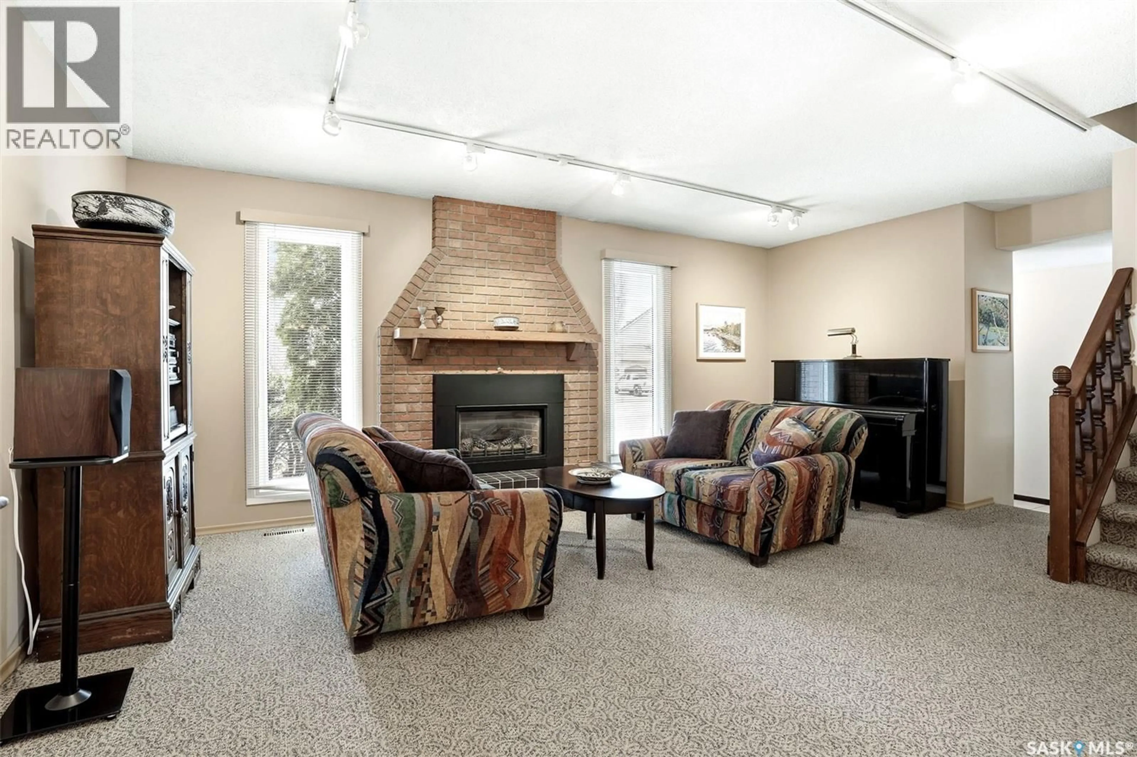 Living room with furniture, carpet floor for 123 GROOME AVENUE, Regina Saskatchewan S4S6S3