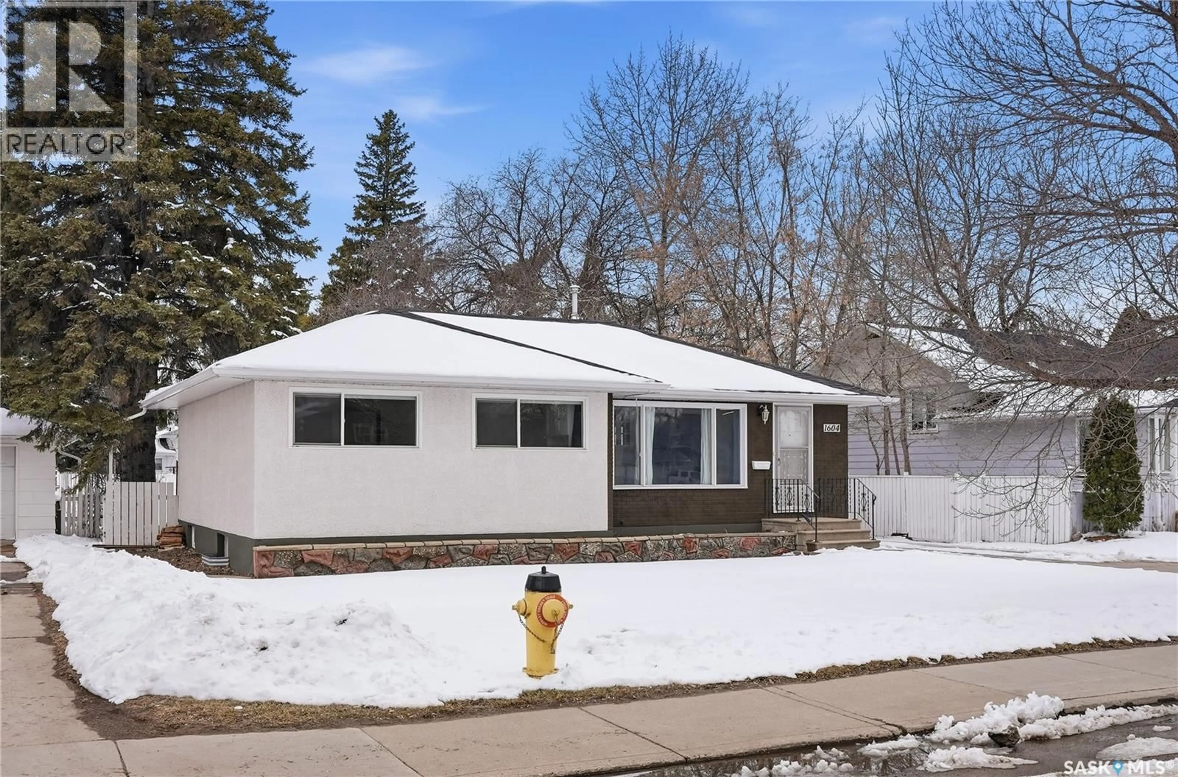 Home with vinyl exterior material, street for 1604 PRESTON AVENUE, Saskatoon Saskatchewan S7H2V8