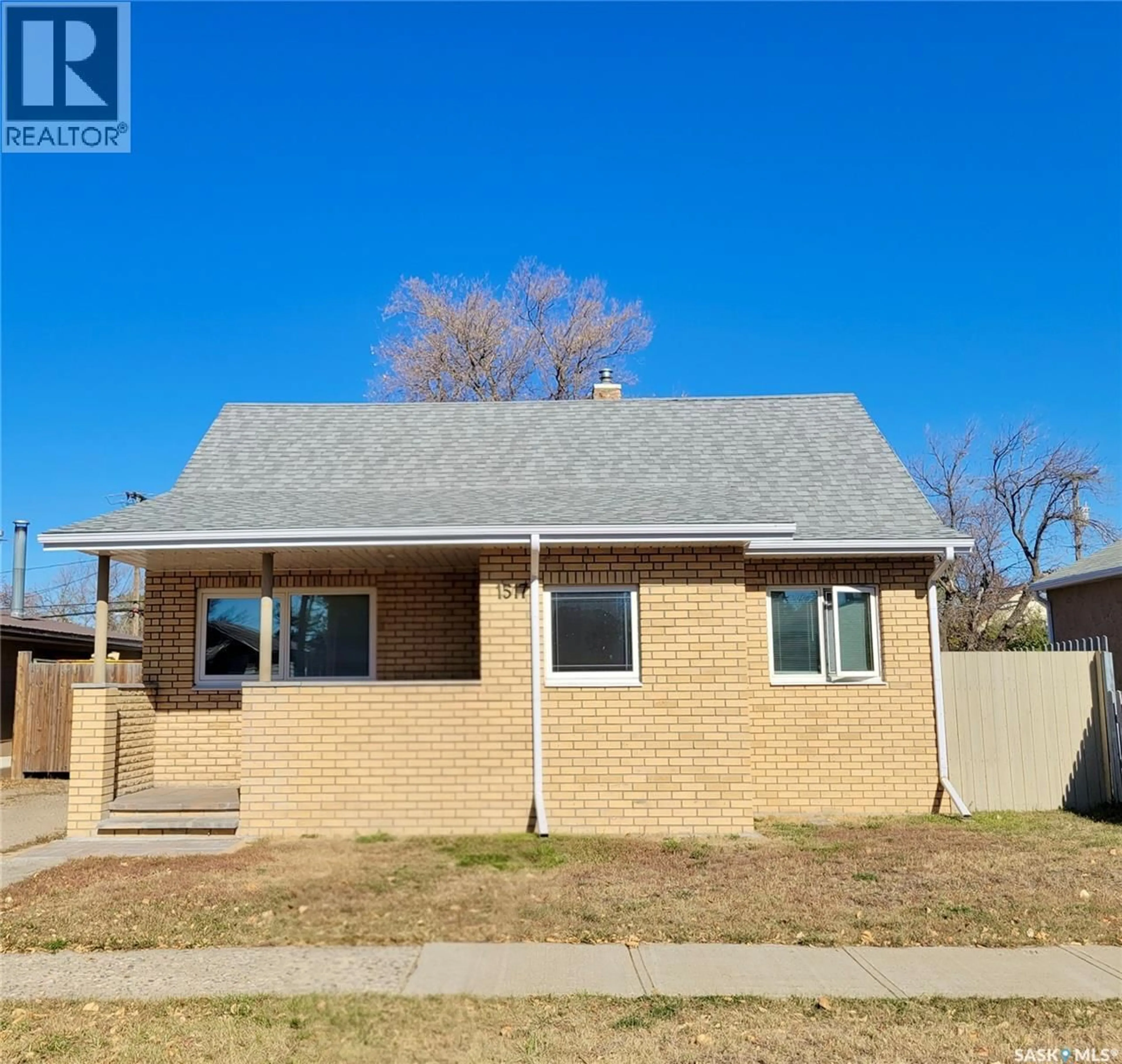Home with brick exterior material, street for 1517 3RD STREET, Estevan Saskatchewan S4A0S5
