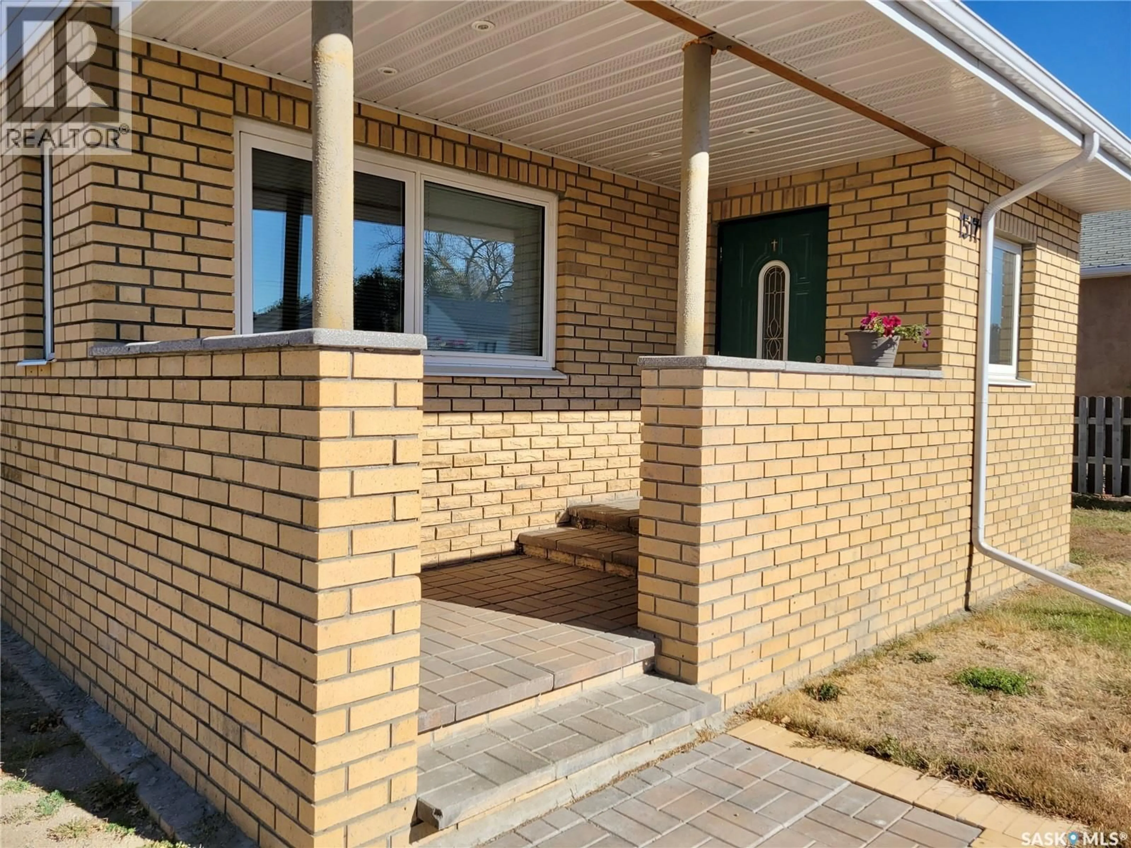 Home with brick exterior material, street for 1517 3RD STREET, Estevan Saskatchewan S4A0S5