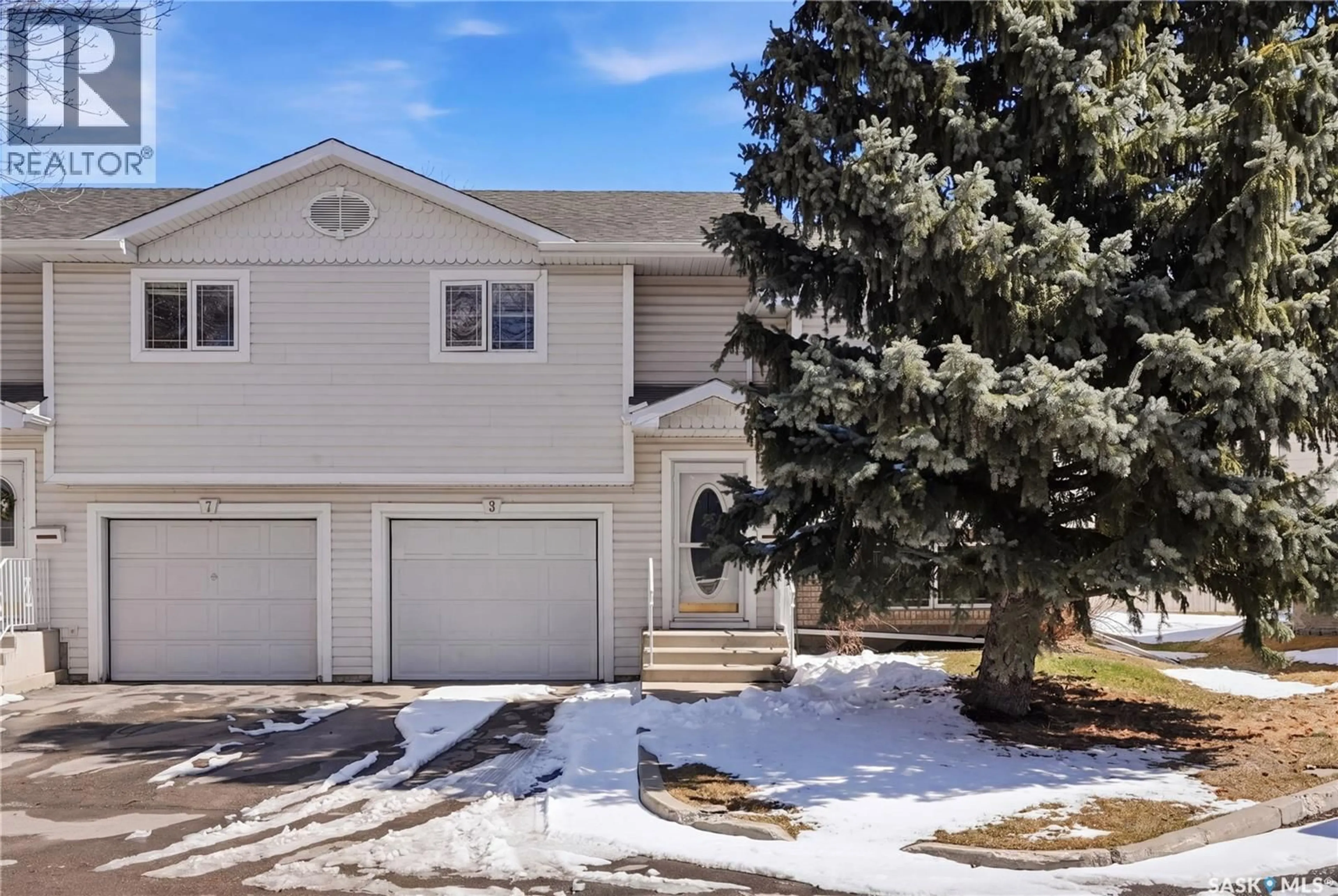 Home with vinyl exterior material, street for 9 605 PEREHUDOFF CRESCENT, Saskatoon Saskatchewan S7N4N7
