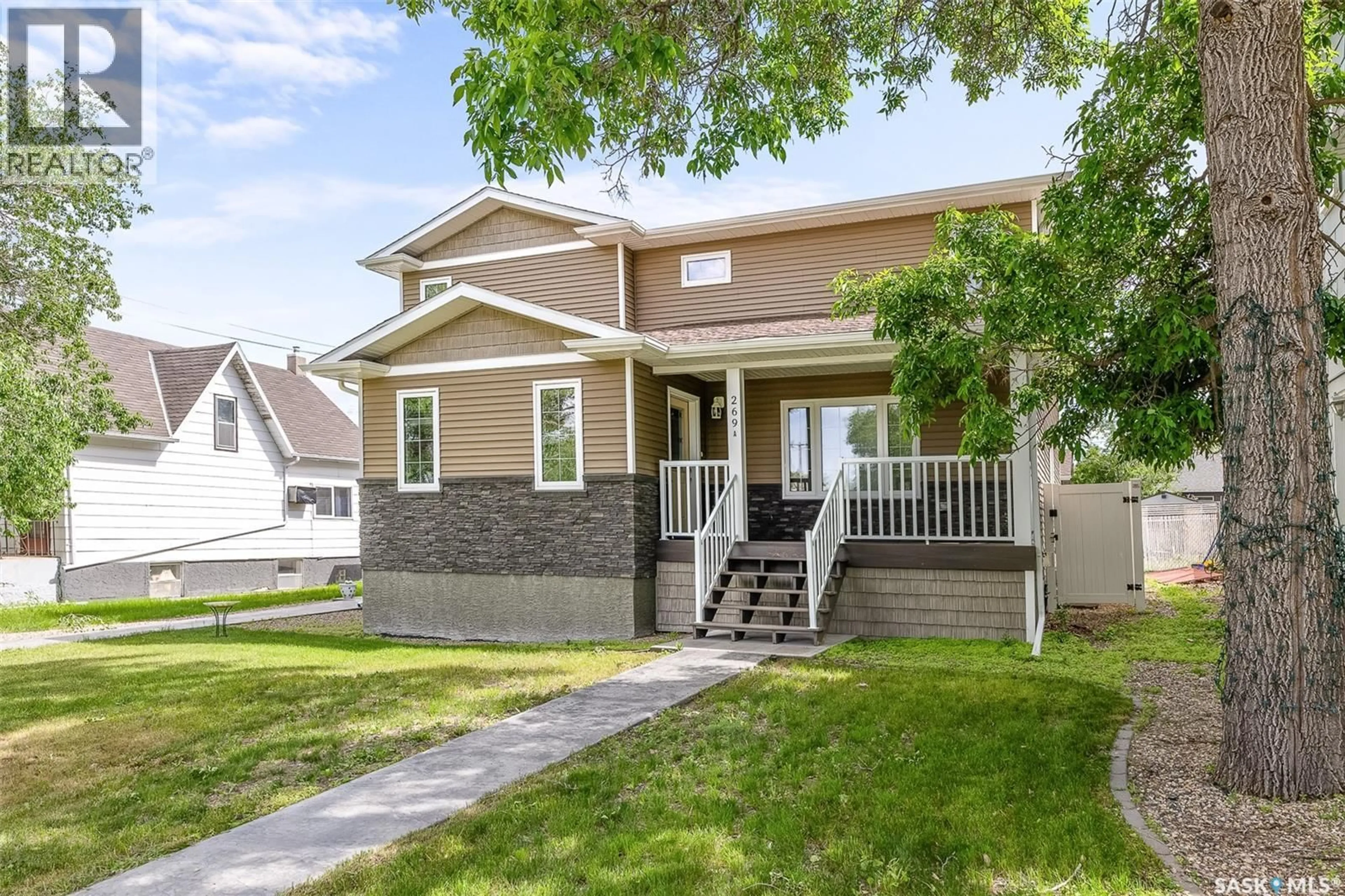 Home with vinyl exterior material, street for 269 HIGH STREET, Moose Jaw Saskatchewan S6H0C4