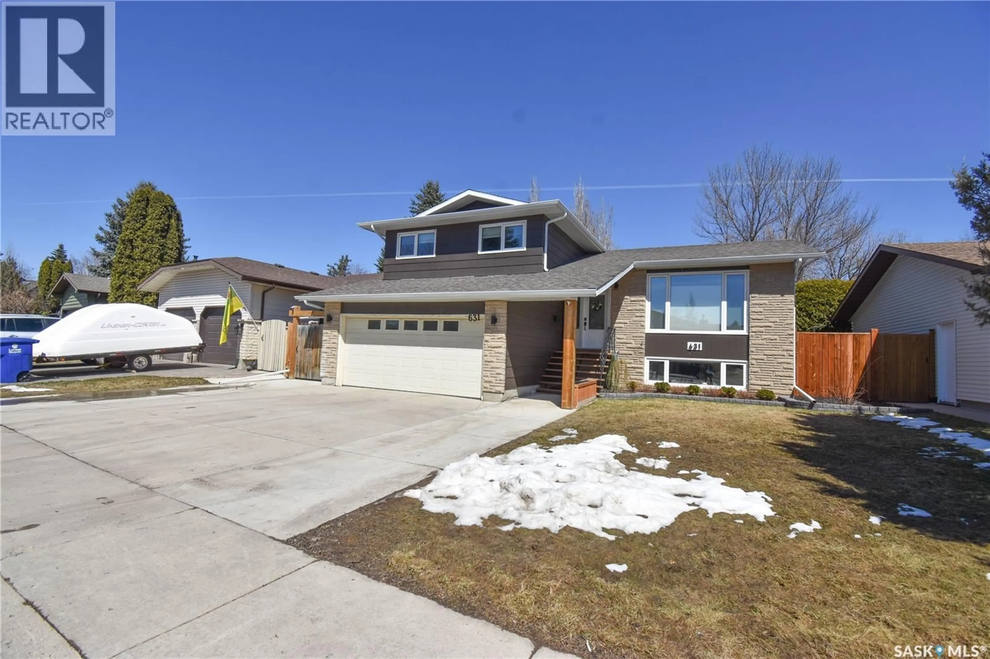 Home with brick exterior material, street for 631 DELARONDE CRESCENT, Saskatoon Saskatchewan S7J3Z9