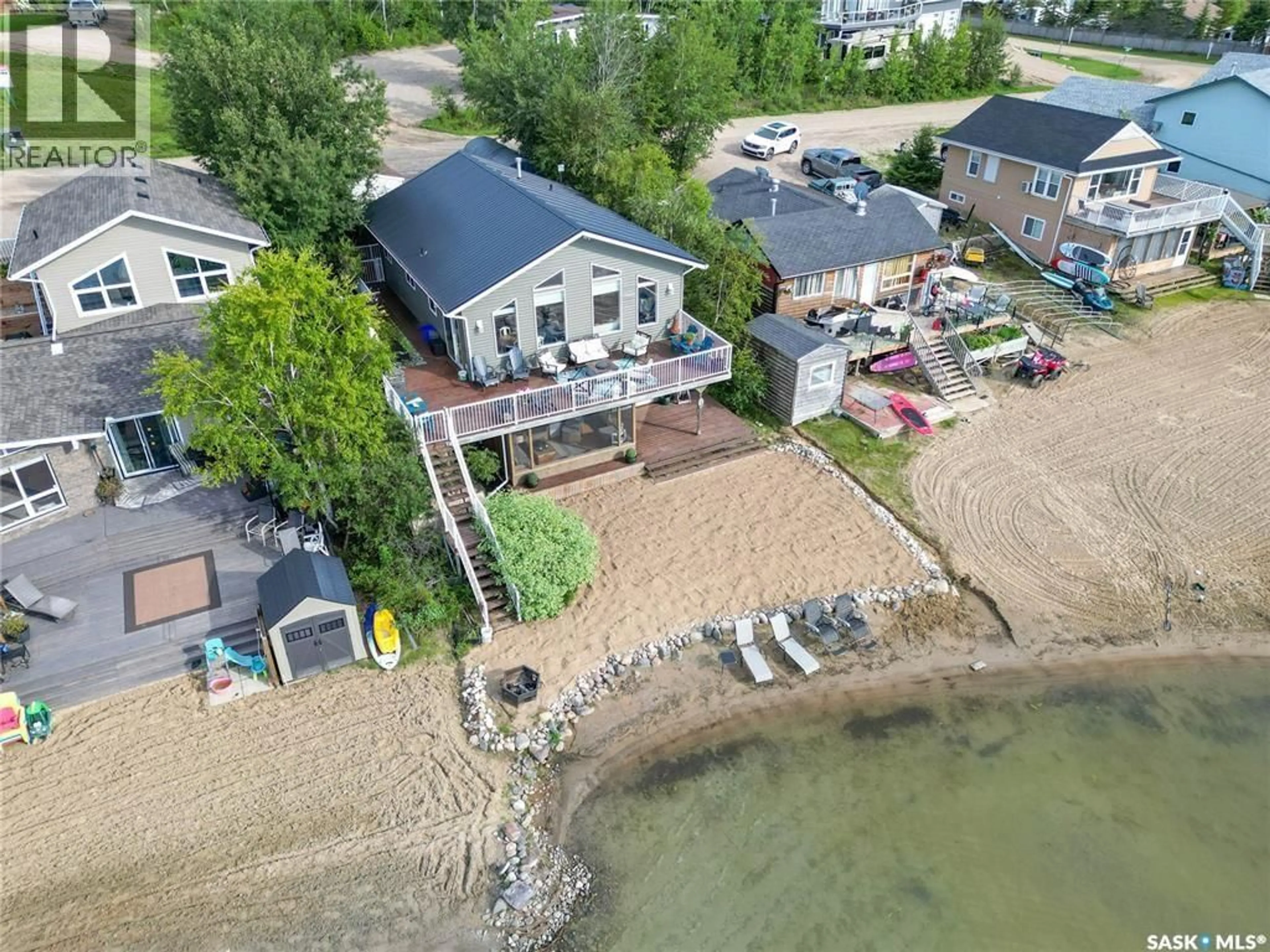A pic from outside/outdoor area/front of a property/back of a property/a pic from drone, water/lake/river/ocean view for 108 JACOBSON DRIVE, Lakeland Rm No. 521 Saskatchewan S0J0N0