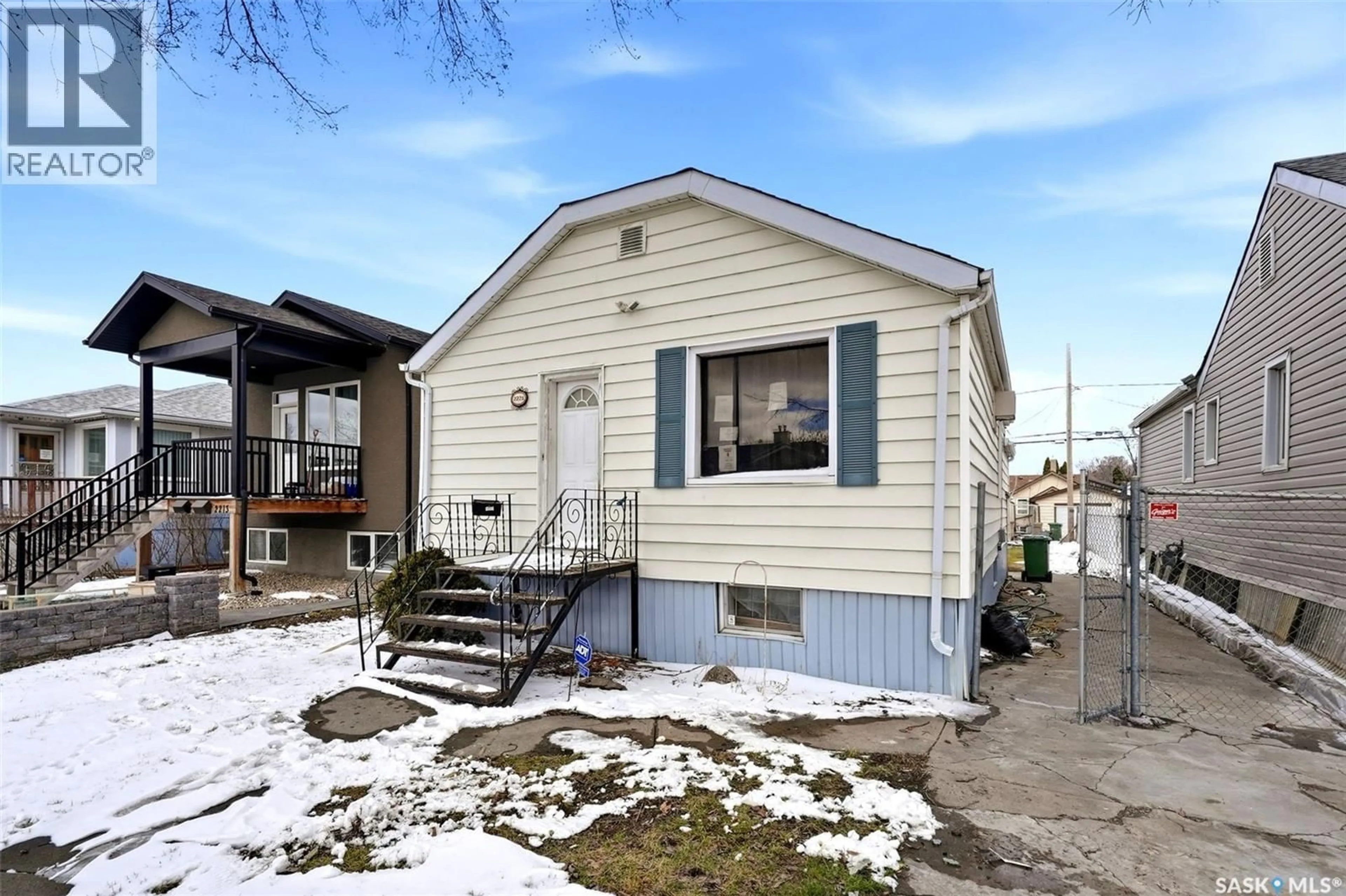 Home with vinyl exterior material, street for 2221 ATKINSON STREET, Regina Saskatchewan S4N3X2