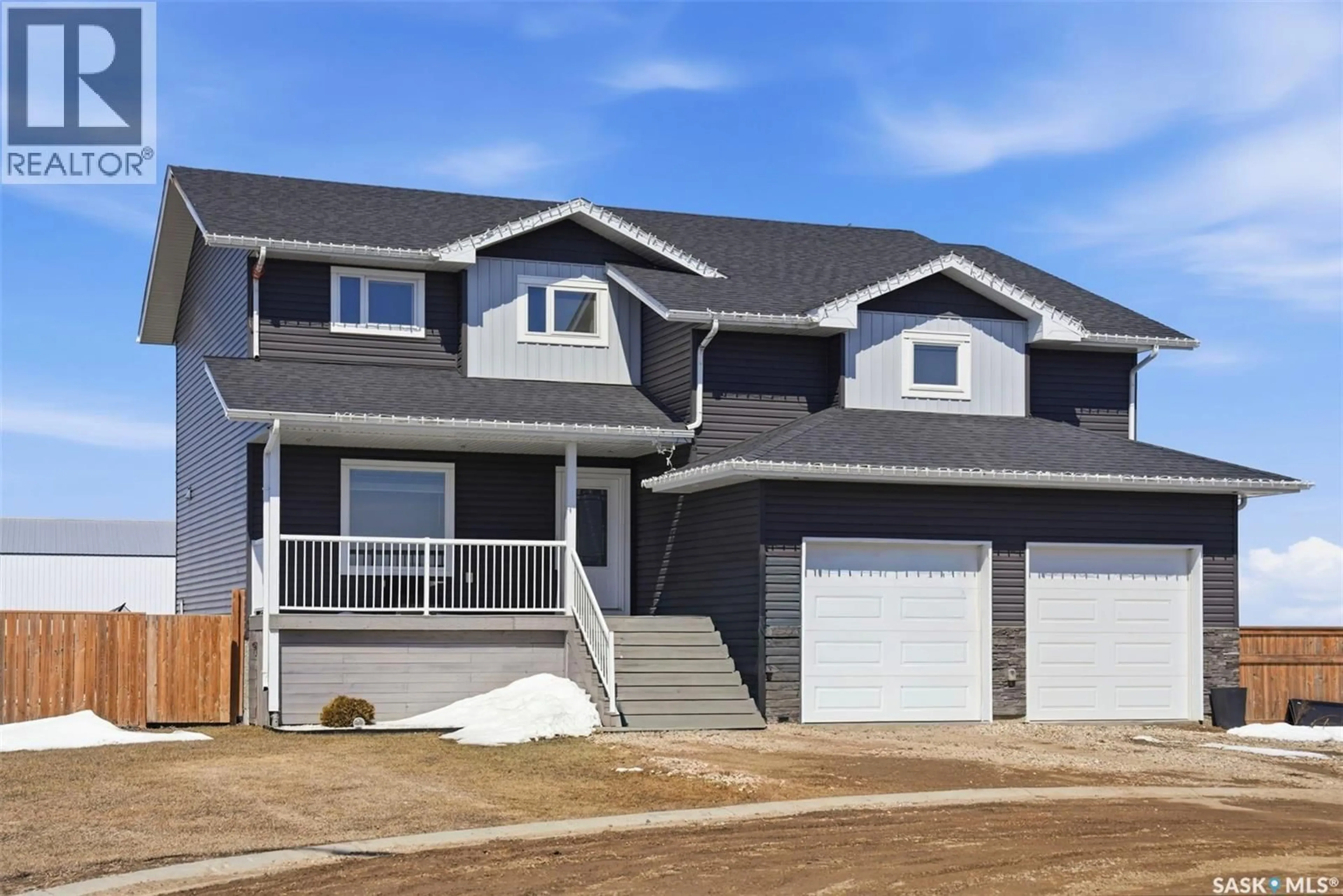 Home with vinyl exterior material, street for 321 HAMM COURT, Aberdeen Saskatchewan S0K0A0