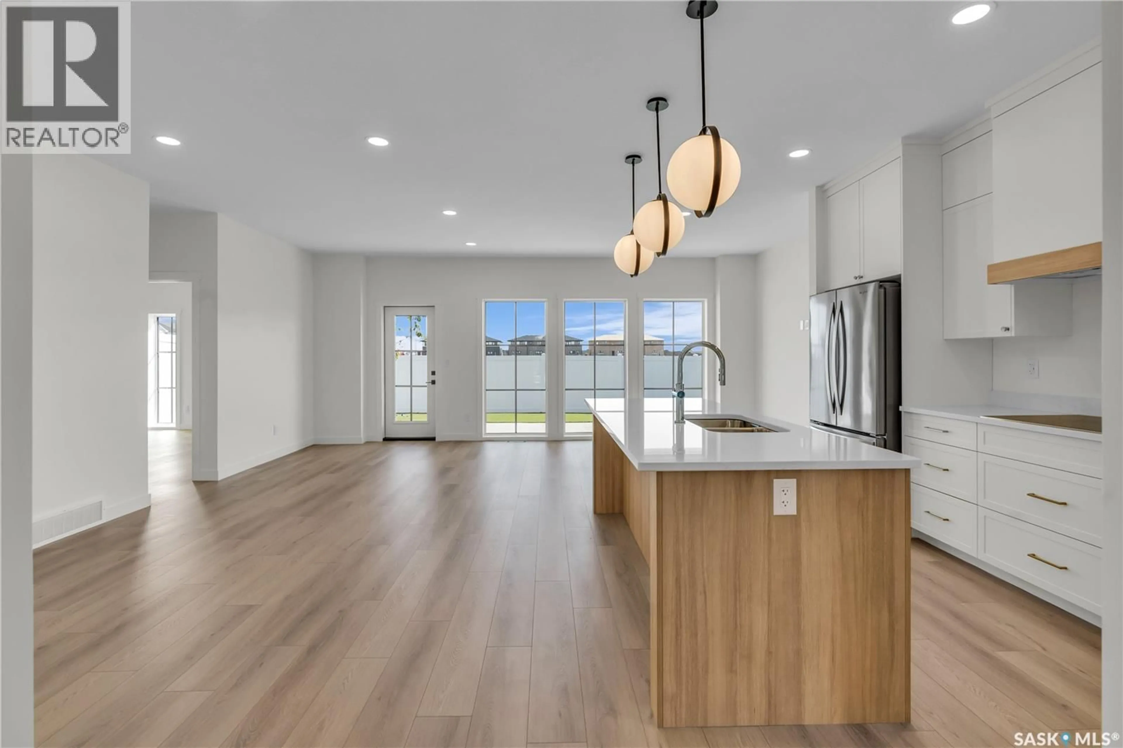 Open concept kitchen, unknown for 20 720 BRIGHTON BOULEVARD, Saskatoon Saskatchewan S7V1X1