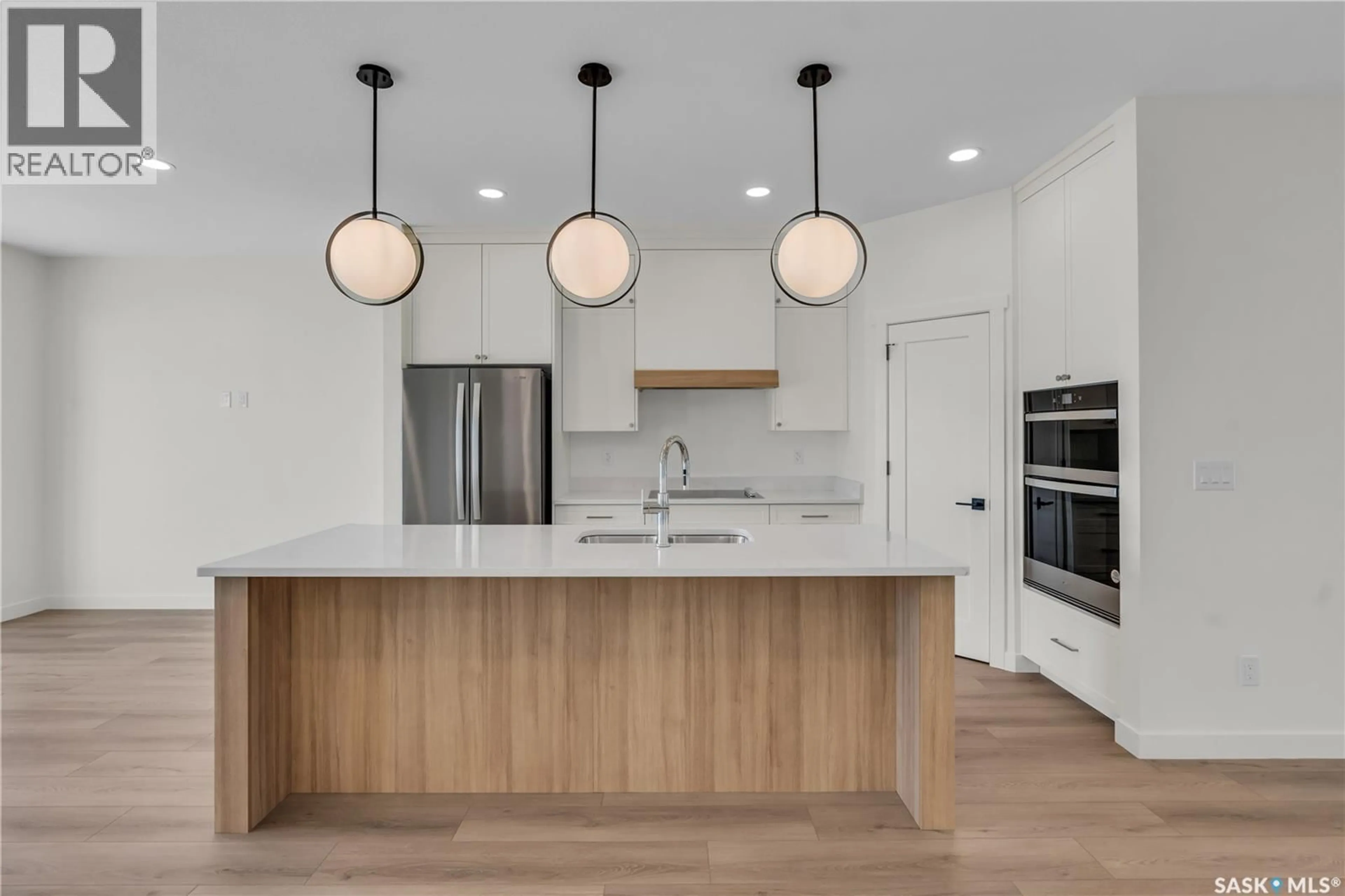 Open concept kitchen, unknown for 20 720 BRIGHTON BOULEVARD, Saskatoon Saskatchewan S7V1X1