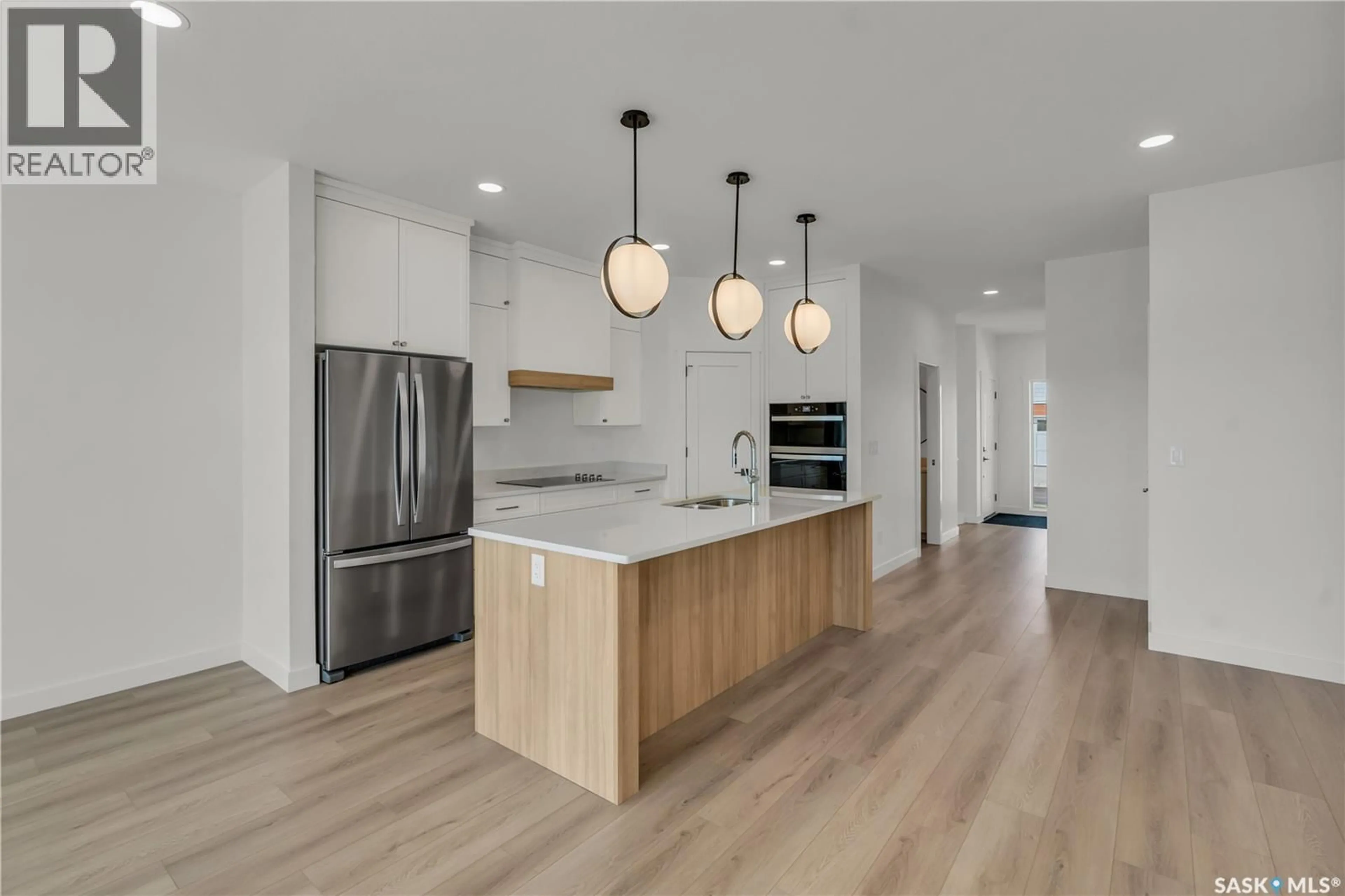 Open concept kitchen, unknown for 20 720 BRIGHTON BOULEVARD, Saskatoon Saskatchewan S7V1X1