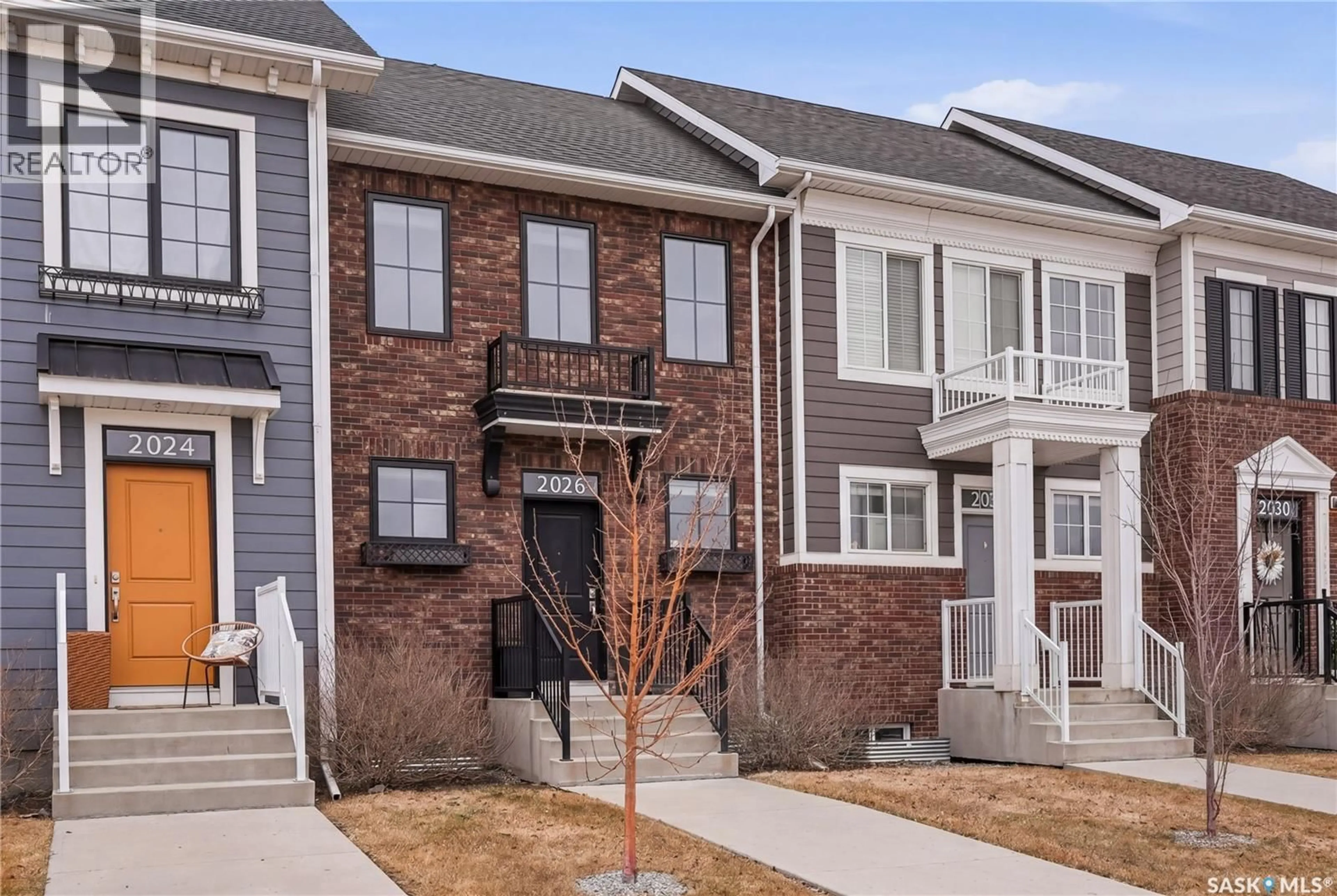 Home with brick exterior material, street for 2026 BRIGHTON COMMON, Saskatoon Saskatchewan S7V0N9