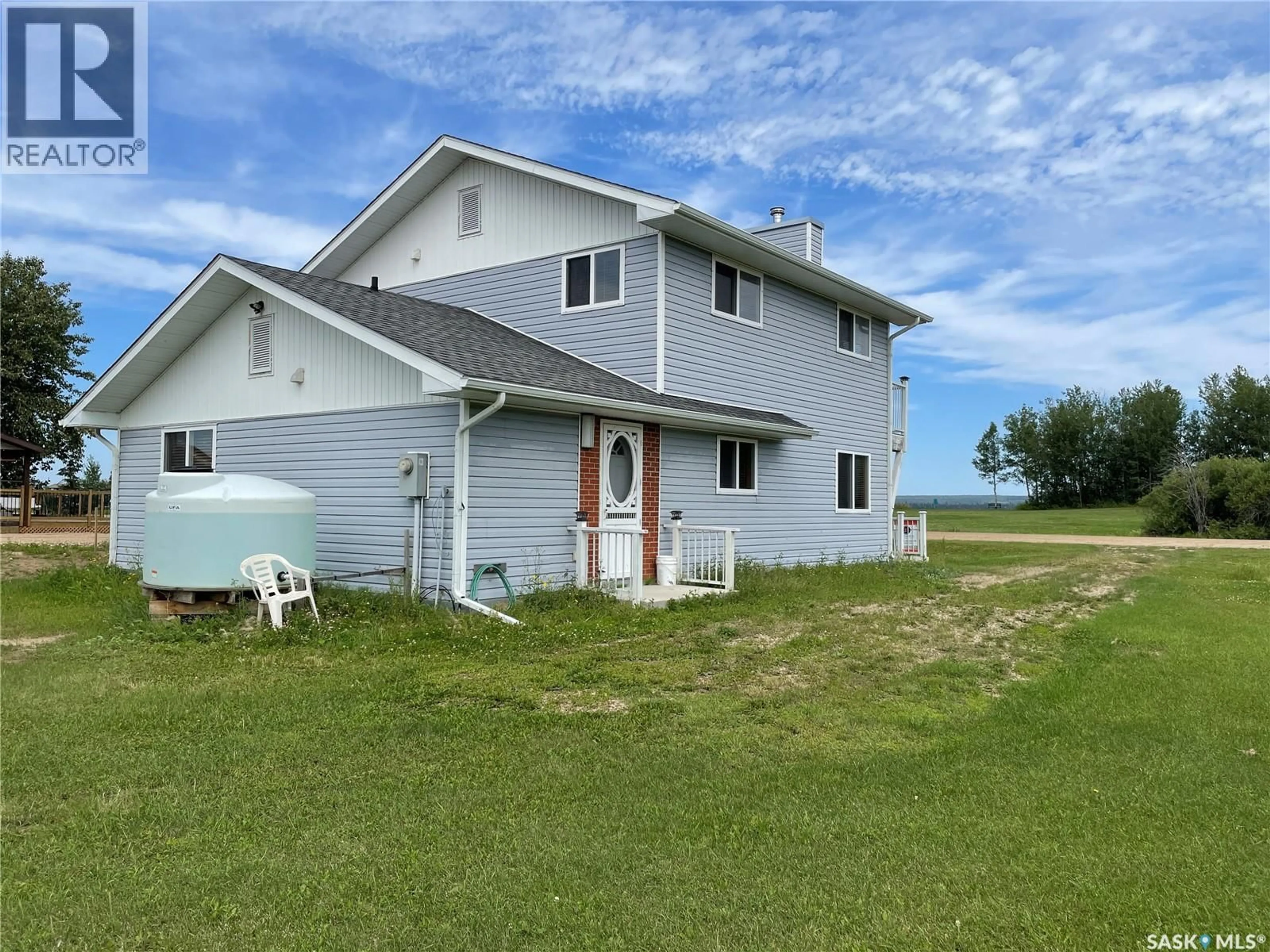 A pic from outside/outdoor area/front of a property/back of a property/a pic from drone, water/lake/river/ocean view for 6 BRONCO DRIVE, Big River Rm No. 555 Saskatchewan S0J0E0