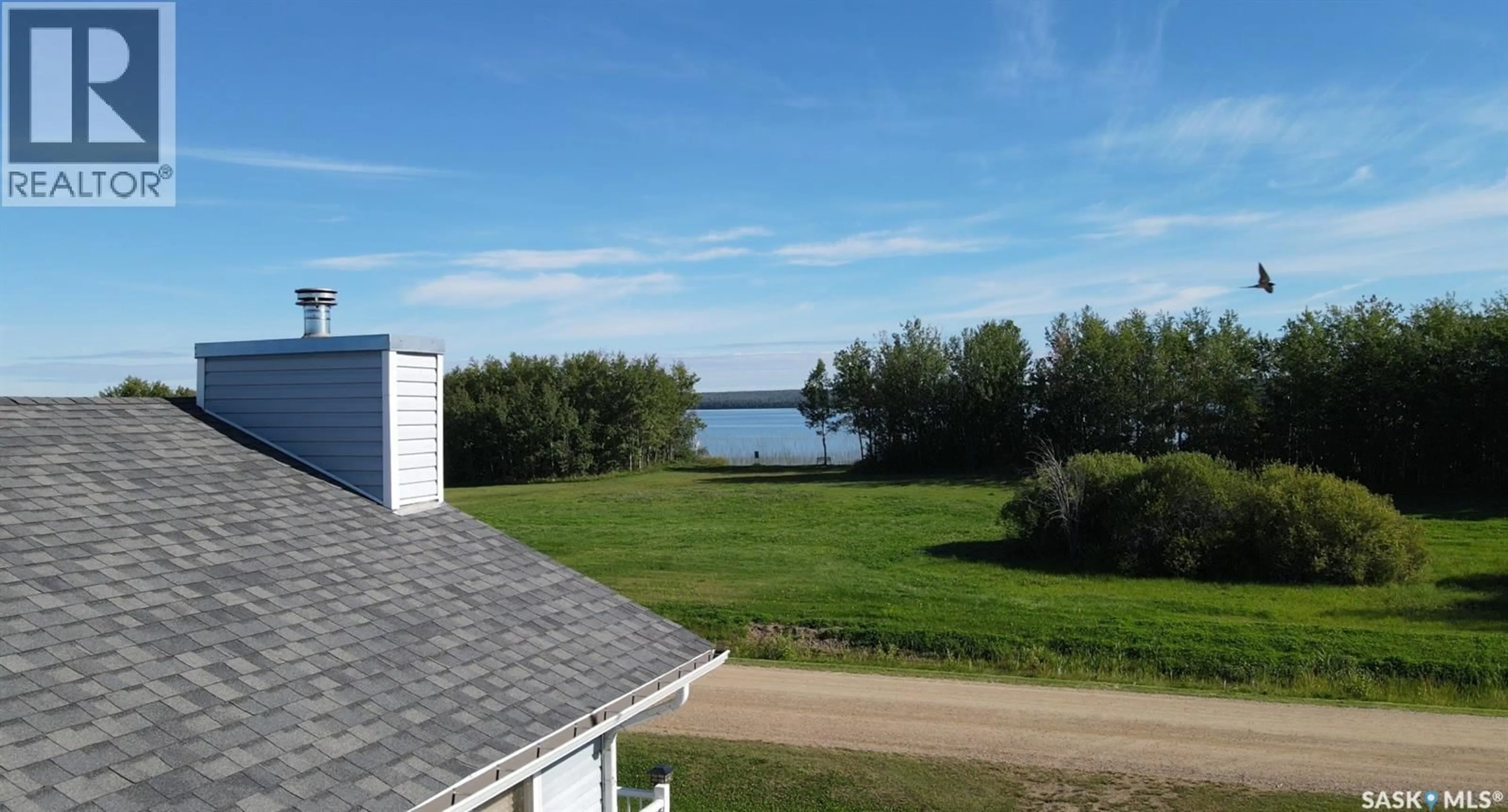 A pic from outside/outdoor area/front of a property/back of a property/a pic from drone, water/lake/river/ocean view for 6 BRONCO DRIVE, Big River Rm No. 555 Saskatchewan S0J0E0
