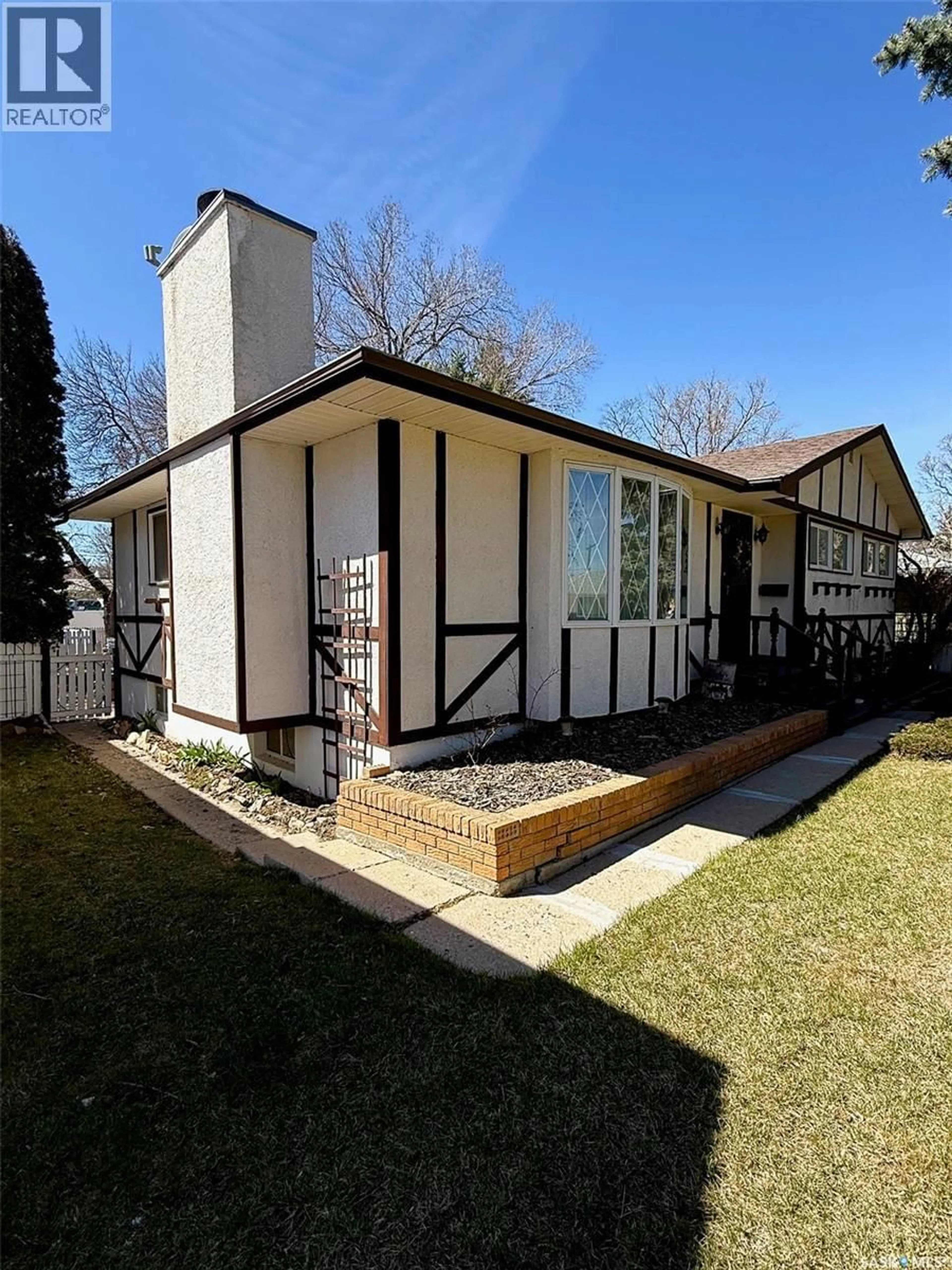 Home with brick exterior material, street for 860 9TH AVENUE, Swift Current Saskatchewan S9H2S7