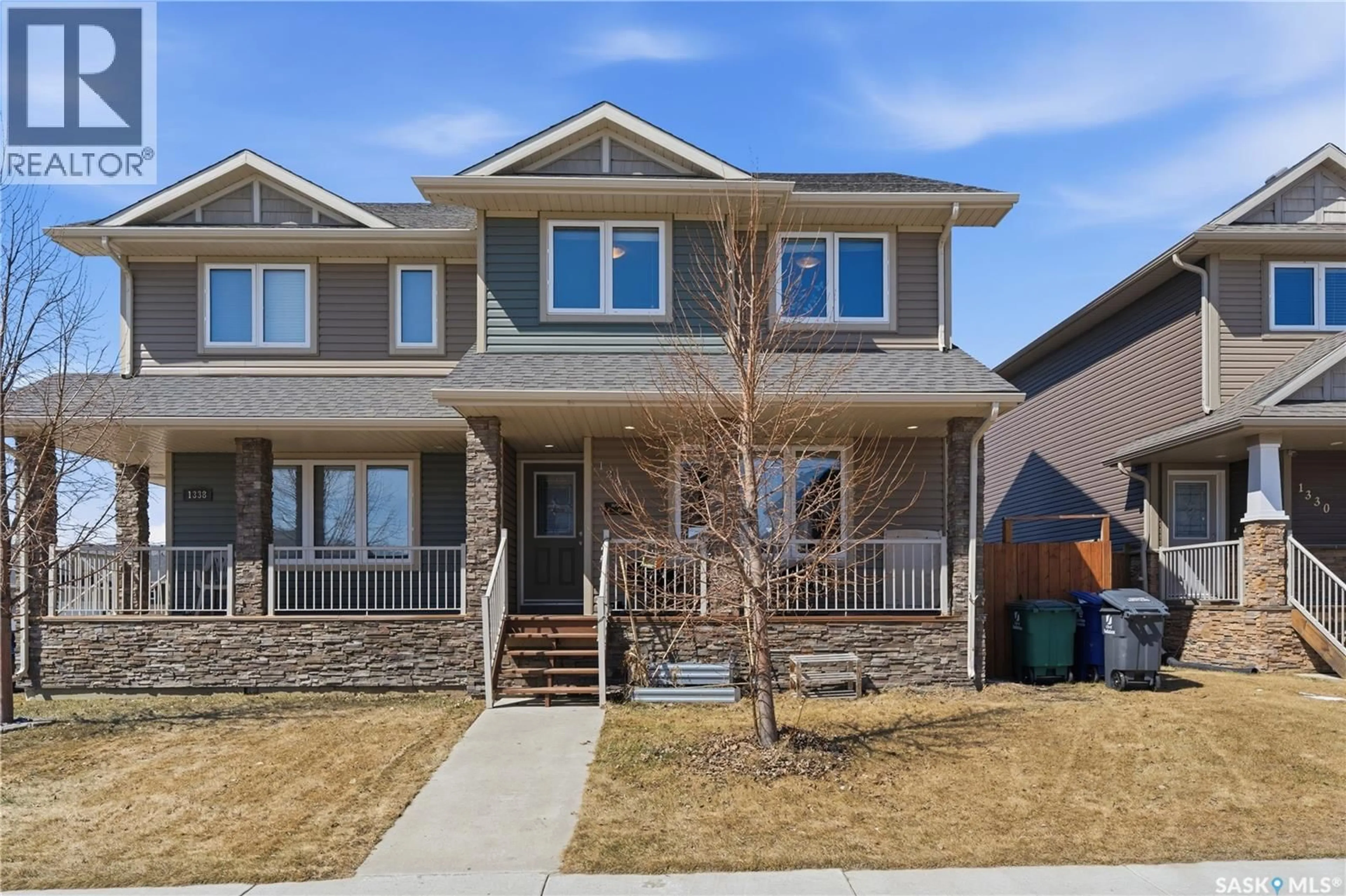 Home with brick exterior material, street for 1334 HUNTER ROAD, Saskatoon Saskatchewan S7T0S5