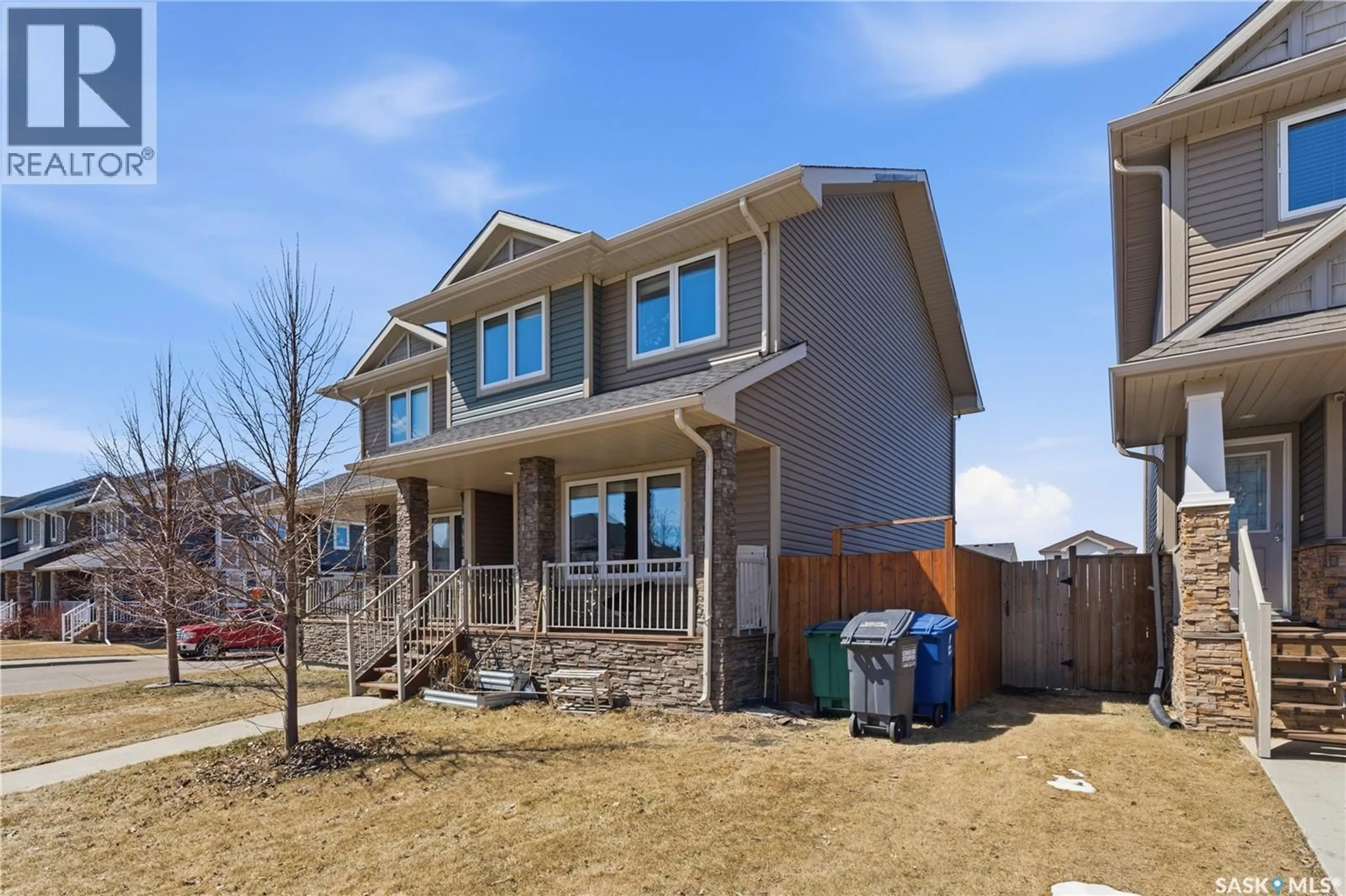 Home with brick exterior material, street for 1334 HUNTER ROAD, Saskatoon Saskatchewan S7T0S5