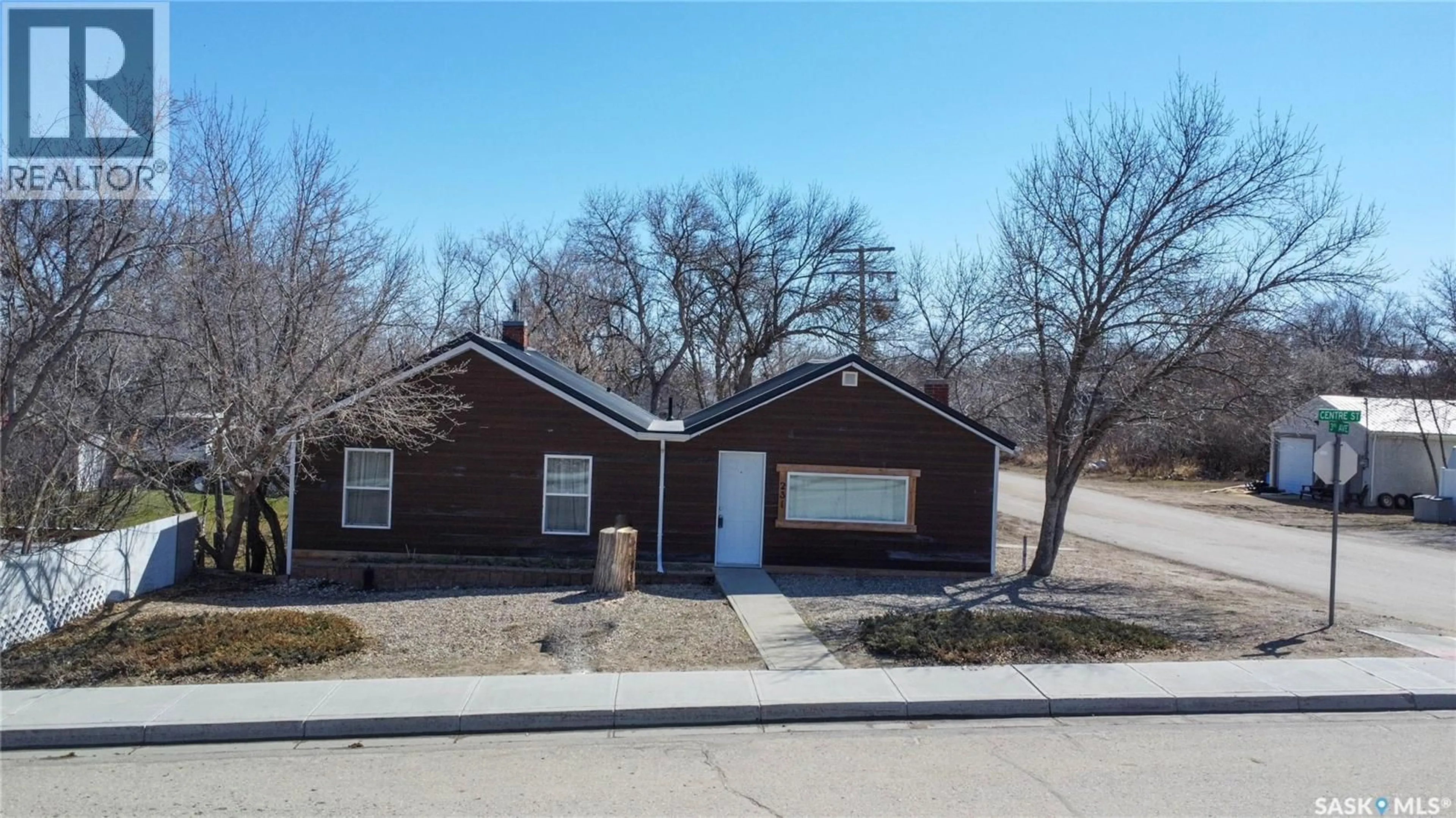 Home with brick exterior material, street for 231 CENTRE STREET, Regina Beach Saskatchewan S0G4C0