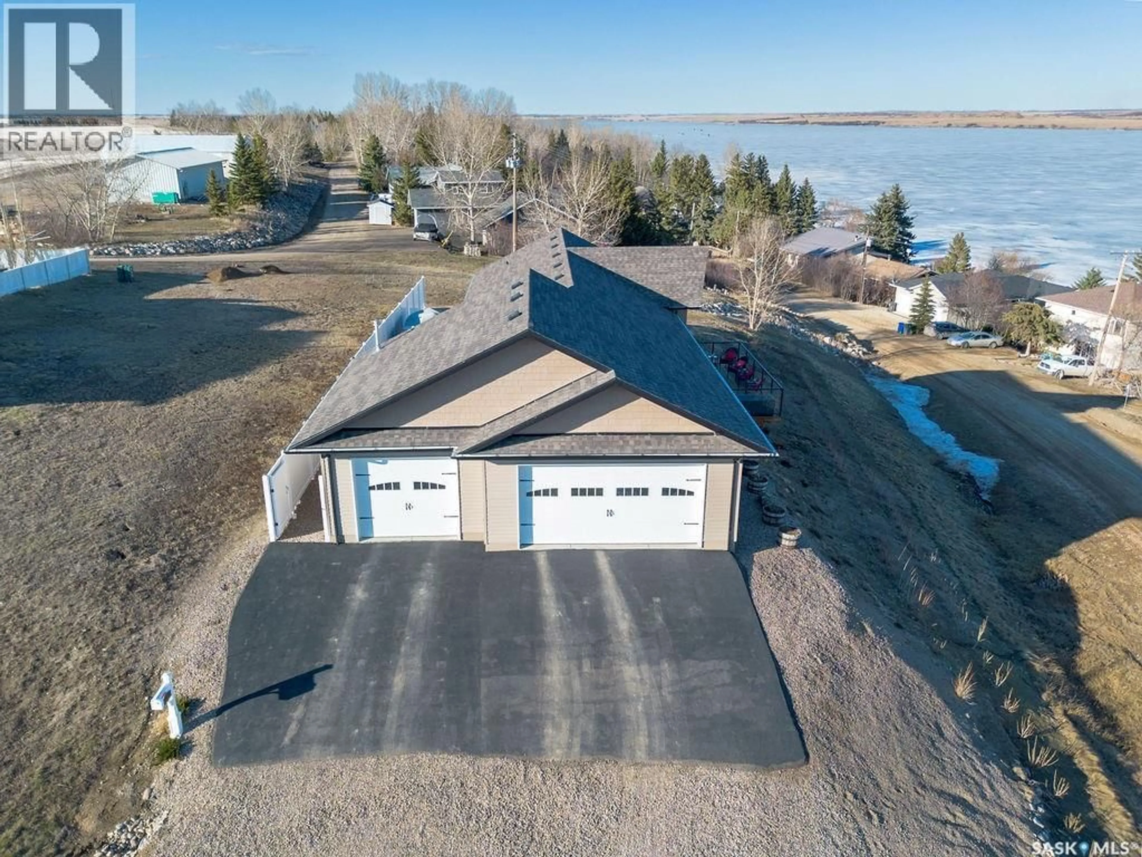 A pic from outside/outdoor area/front of a property/back of a property/a pic from drone, water/lake/river/ocean view for 1 SHORTT ROAD, Shields Saskatchewan S7C0A2