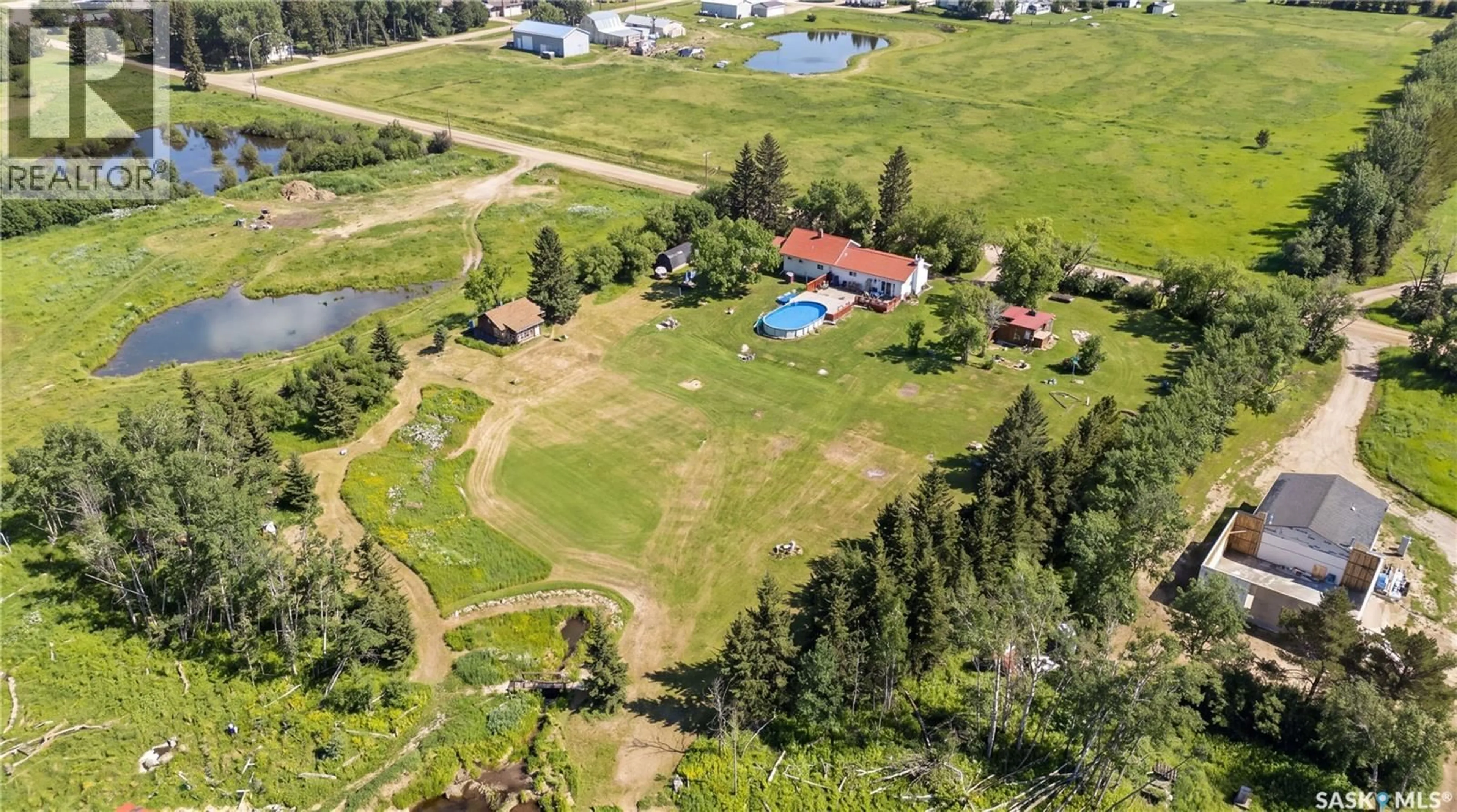 A pic from outside/outdoor area/front of a property/back of a property/a pic from drone, water/lake/river/ocean view for 103 1ST STREET, Hepburn Saskatchewan S0K1Z0