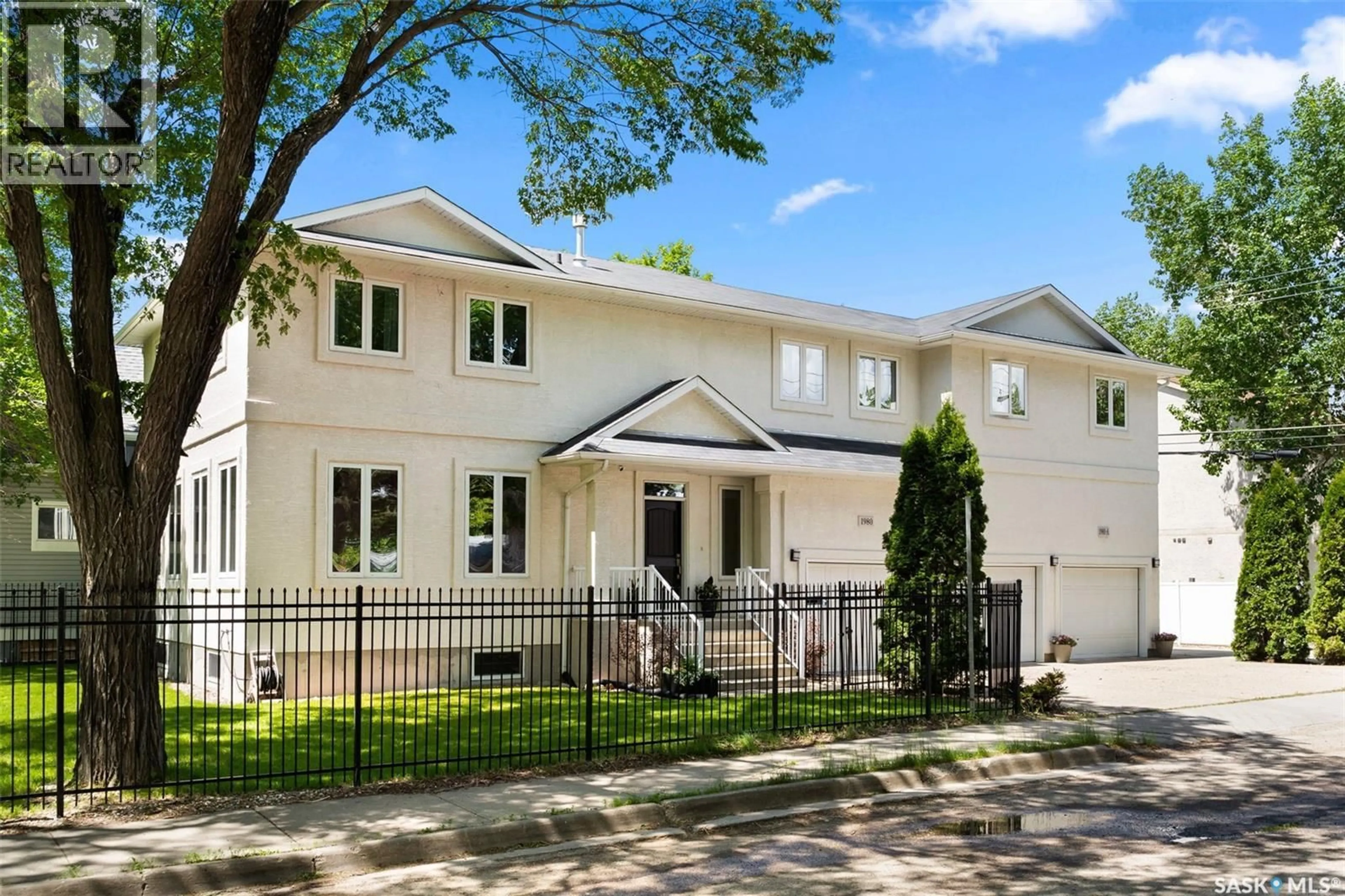 Home with vinyl exterior material, street for 1980 OTTAWA STREET, Regina Saskatchewan S4P1P6