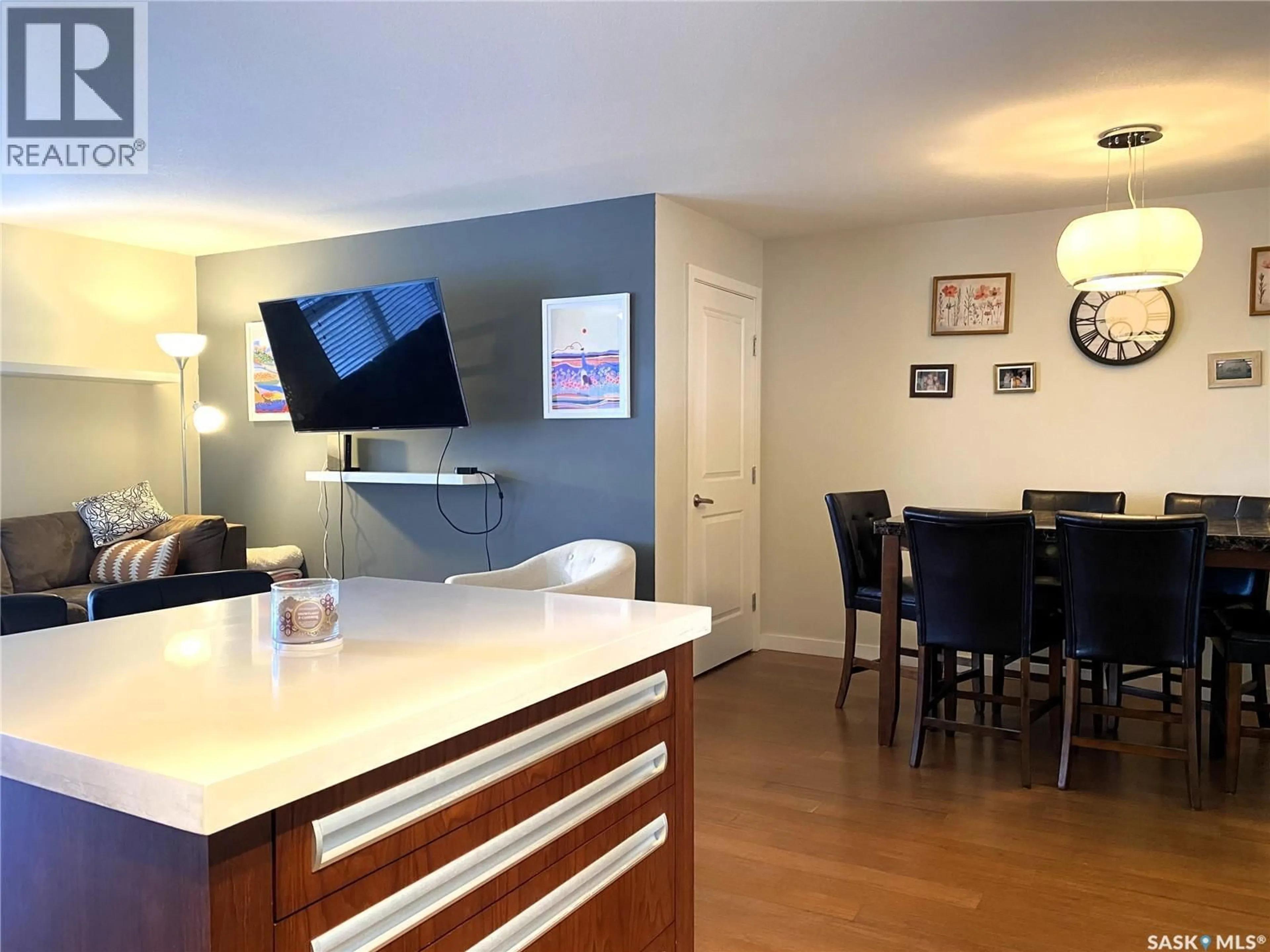 Open concept kitchen, wood/laminate floor for 1015 - 2407 PATRICK CRESCENT, Saskatoon Saskatchewan S7W0M6