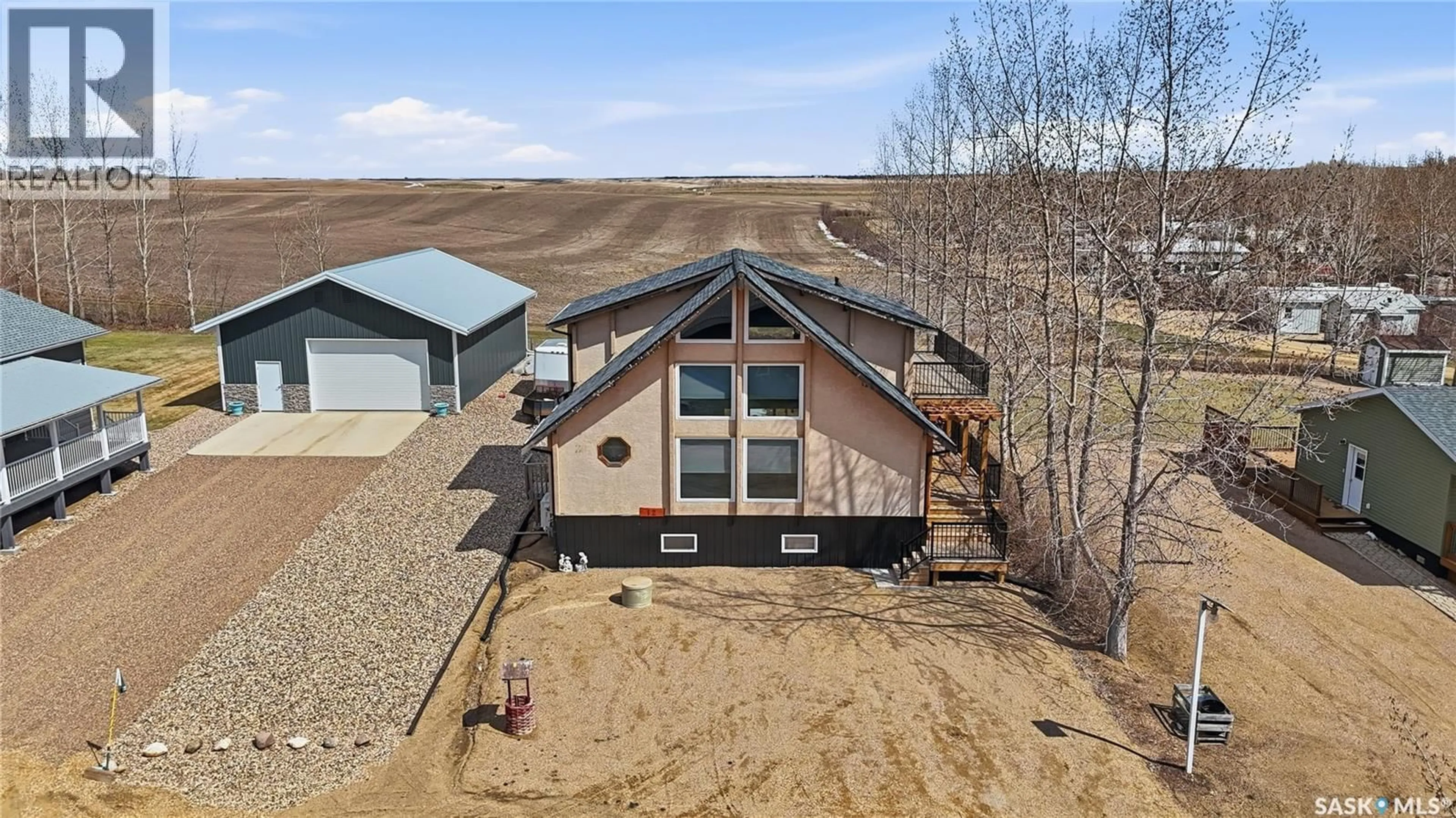 A pic from outside/outdoor area/front of a property/back of a property/a pic from drone, building for 12 FINCH CRESCENT, Wood River Rm No. 74 Saskatchewan S0H2K0