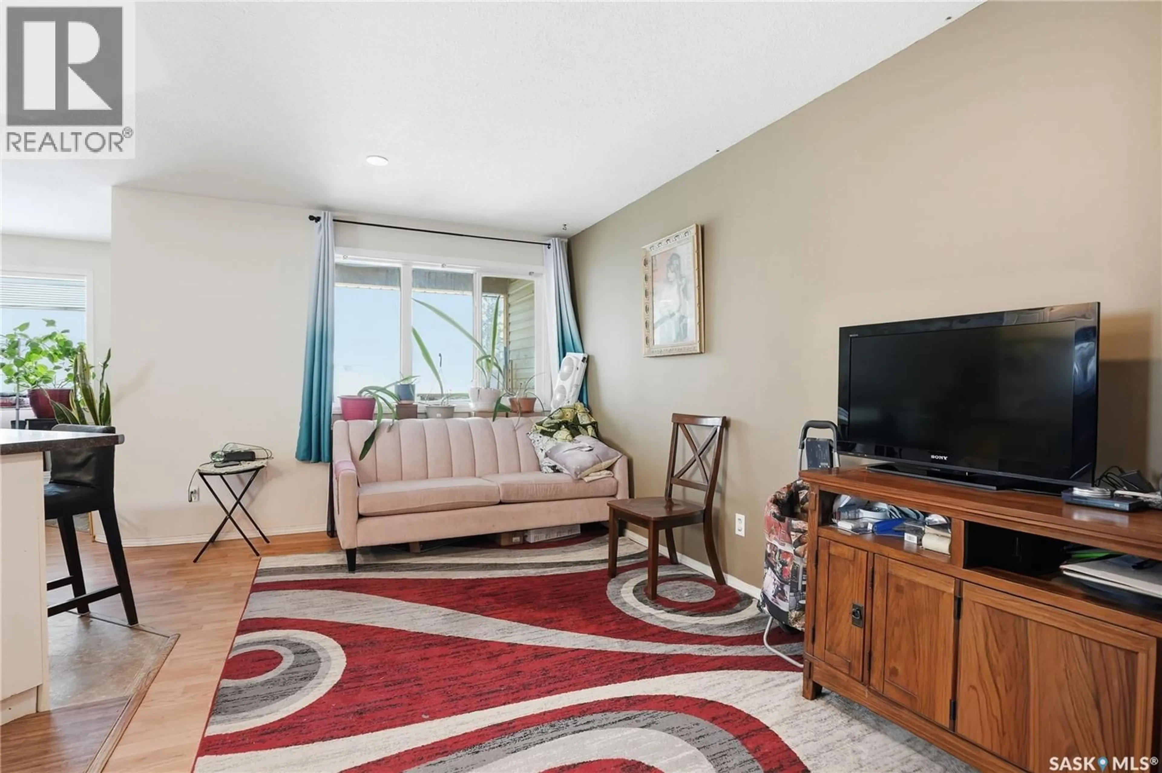 Living room with furniture, unknown for 222 V AVENUE, Saskatoon Saskatchewan S7M3B3