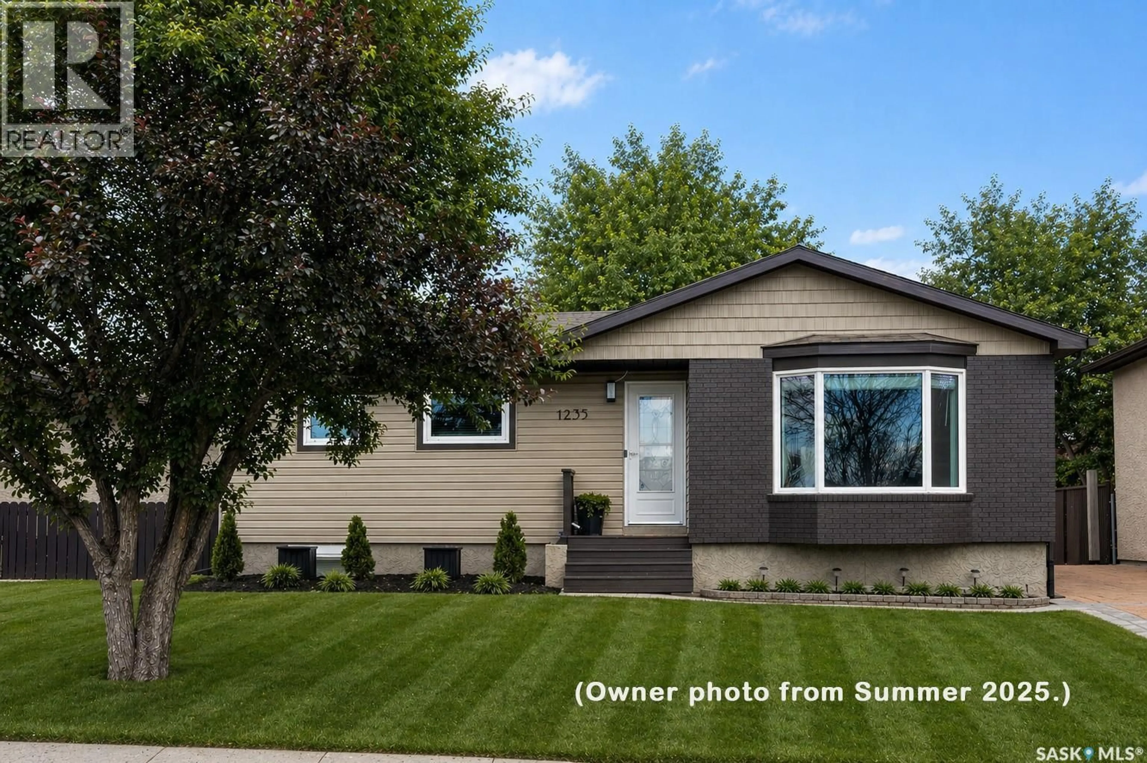 Home with vinyl exterior material, street for 1235 BOURNE STREET, Regina Saskatchewan S4X3C1