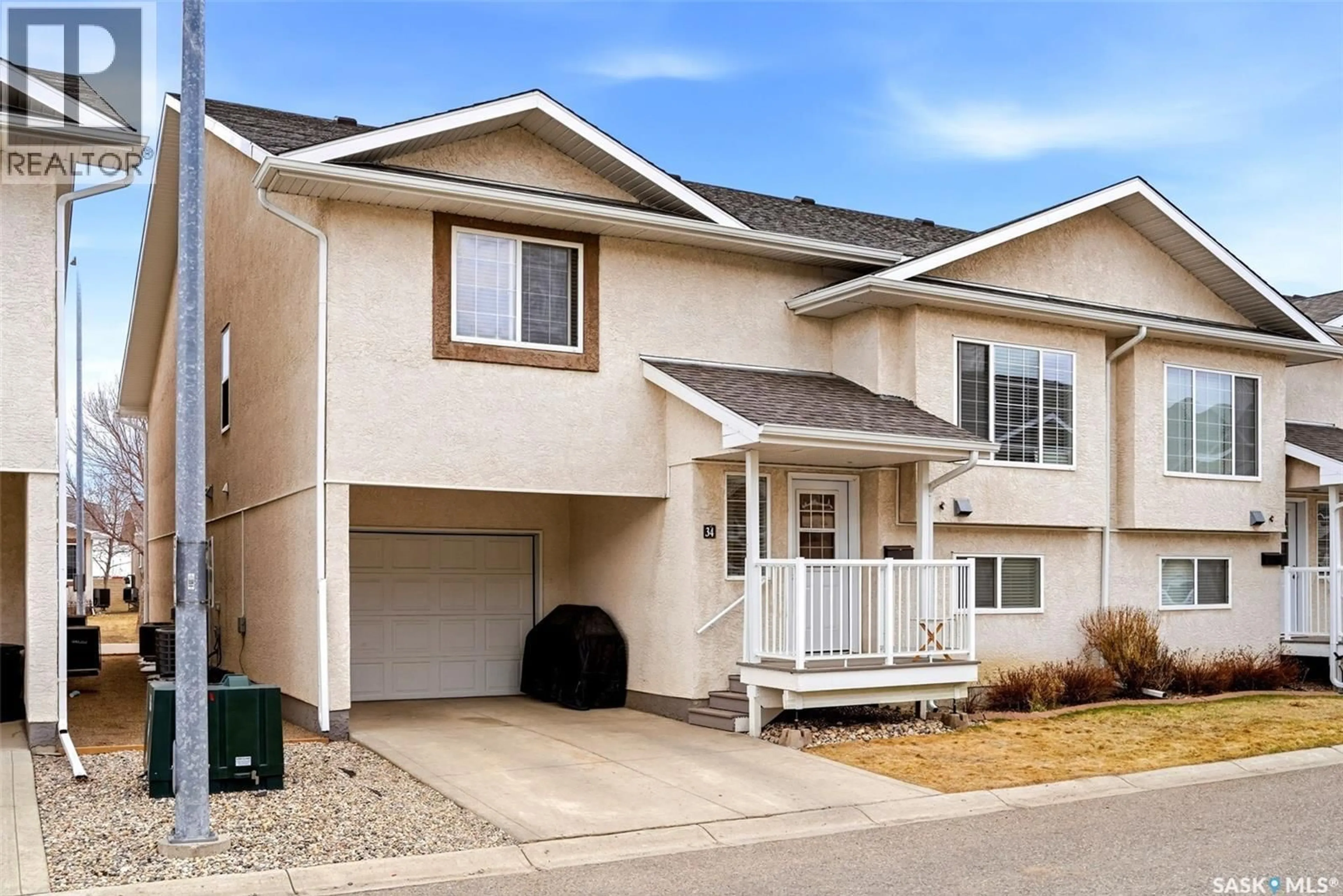 Home with vinyl exterior material, street for 34 - 4425 NICURITY DRIVE, Regina Saskatchewan S4X0E6