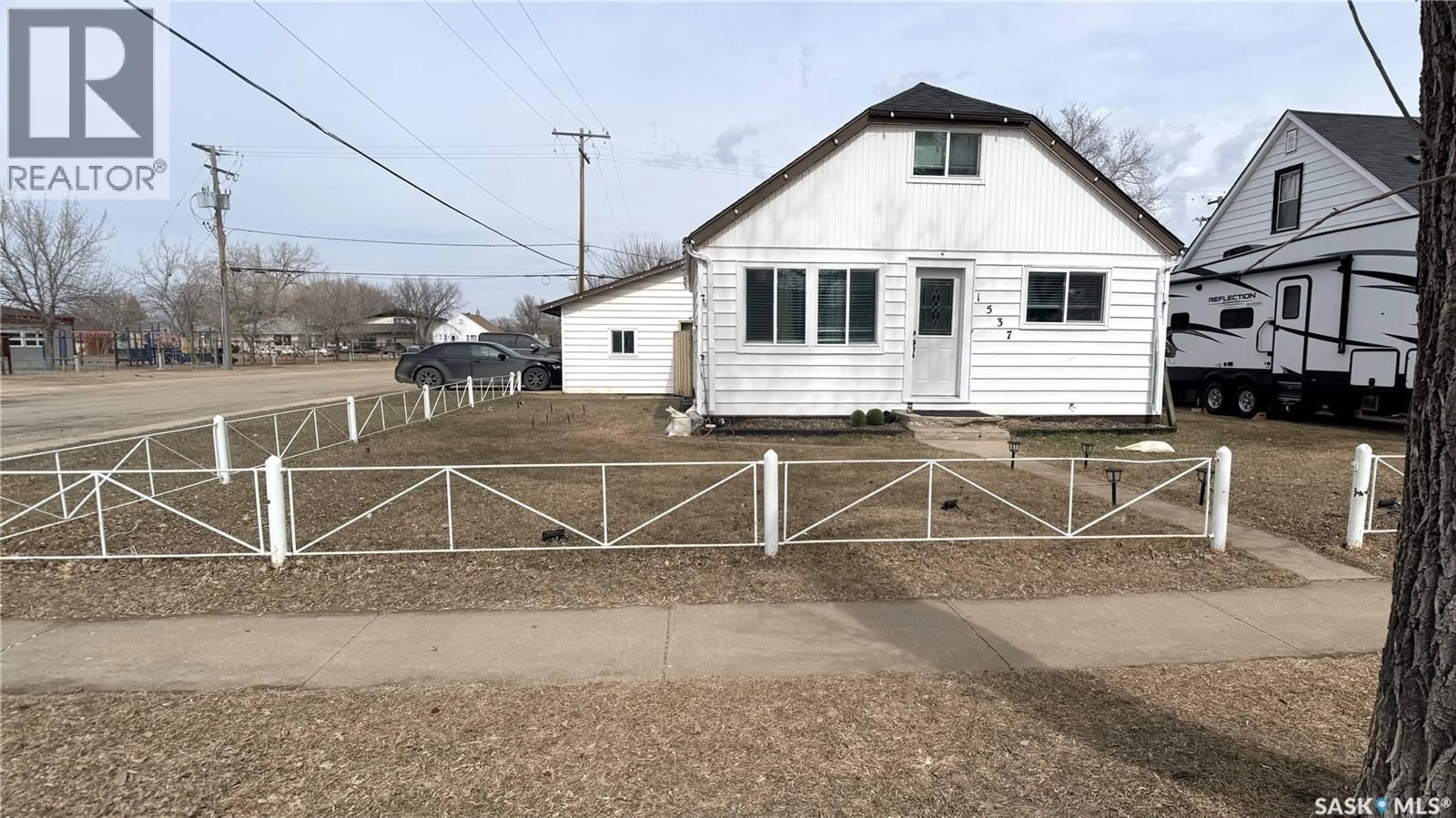 A pic from outside/outdoor area/front of a property/back of a property/a pic from drone, street for 1537 SECOND STREET, Estevan Saskatchewan S4A2M9
