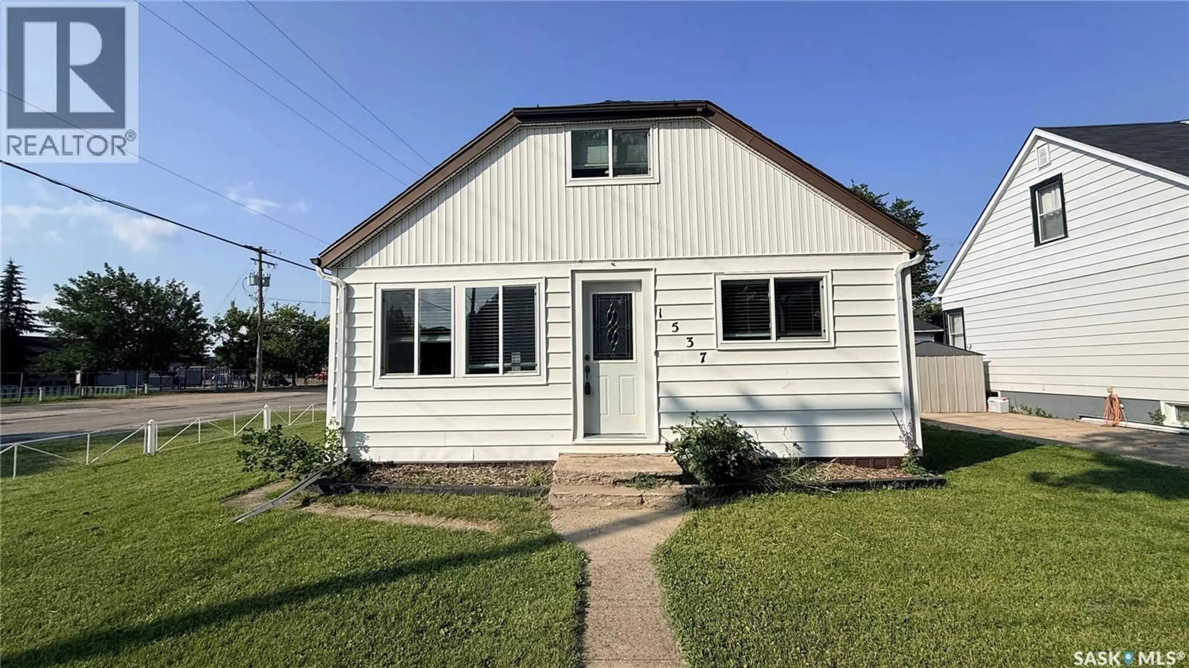 Home with vinyl exterior material, street for 1537 SECOND STREET, Estevan Saskatchewan S4A2M9