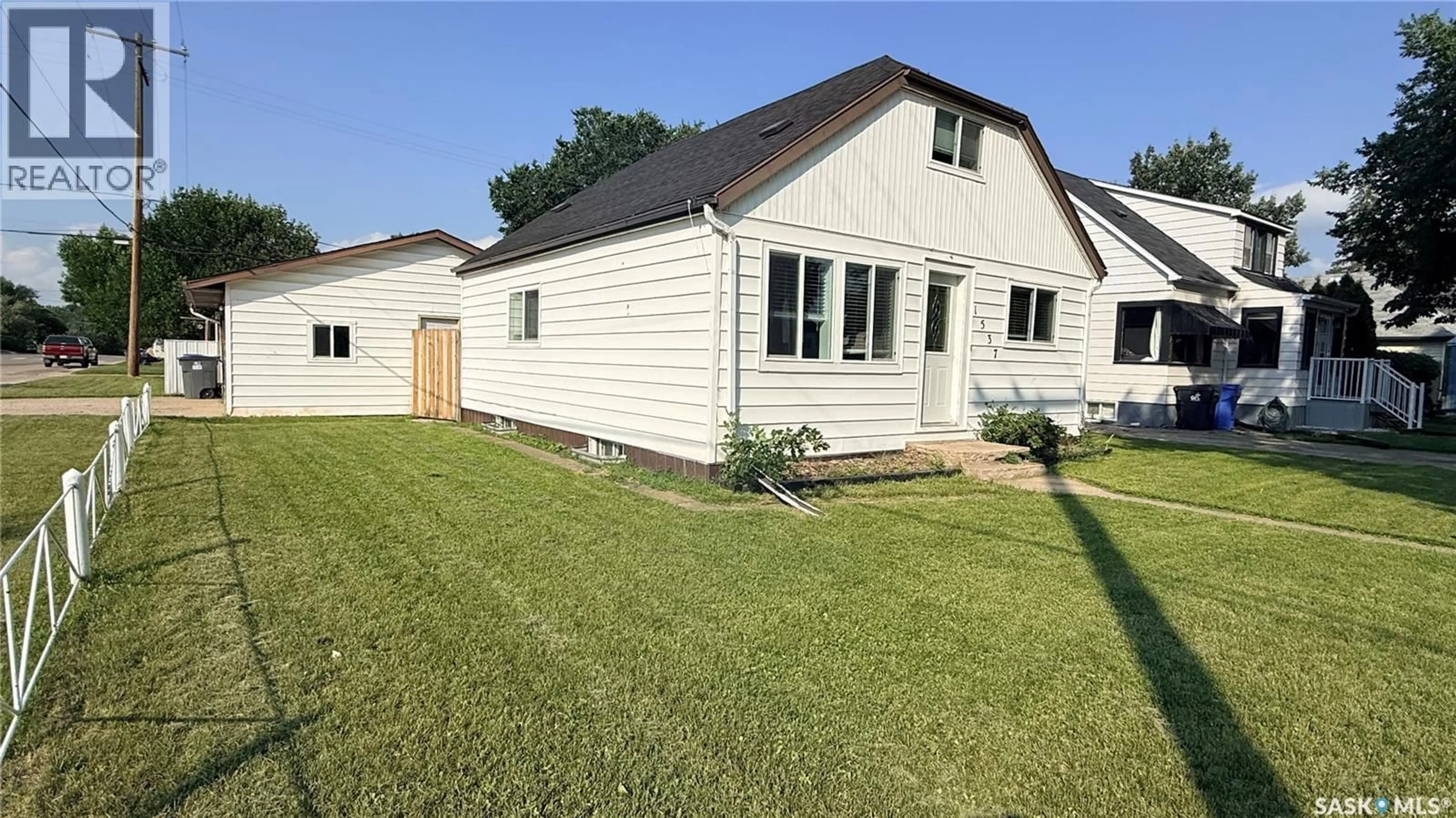 Home with vinyl exterior material, street for 1537 SECOND STREET, Estevan Saskatchewan S4A2M9