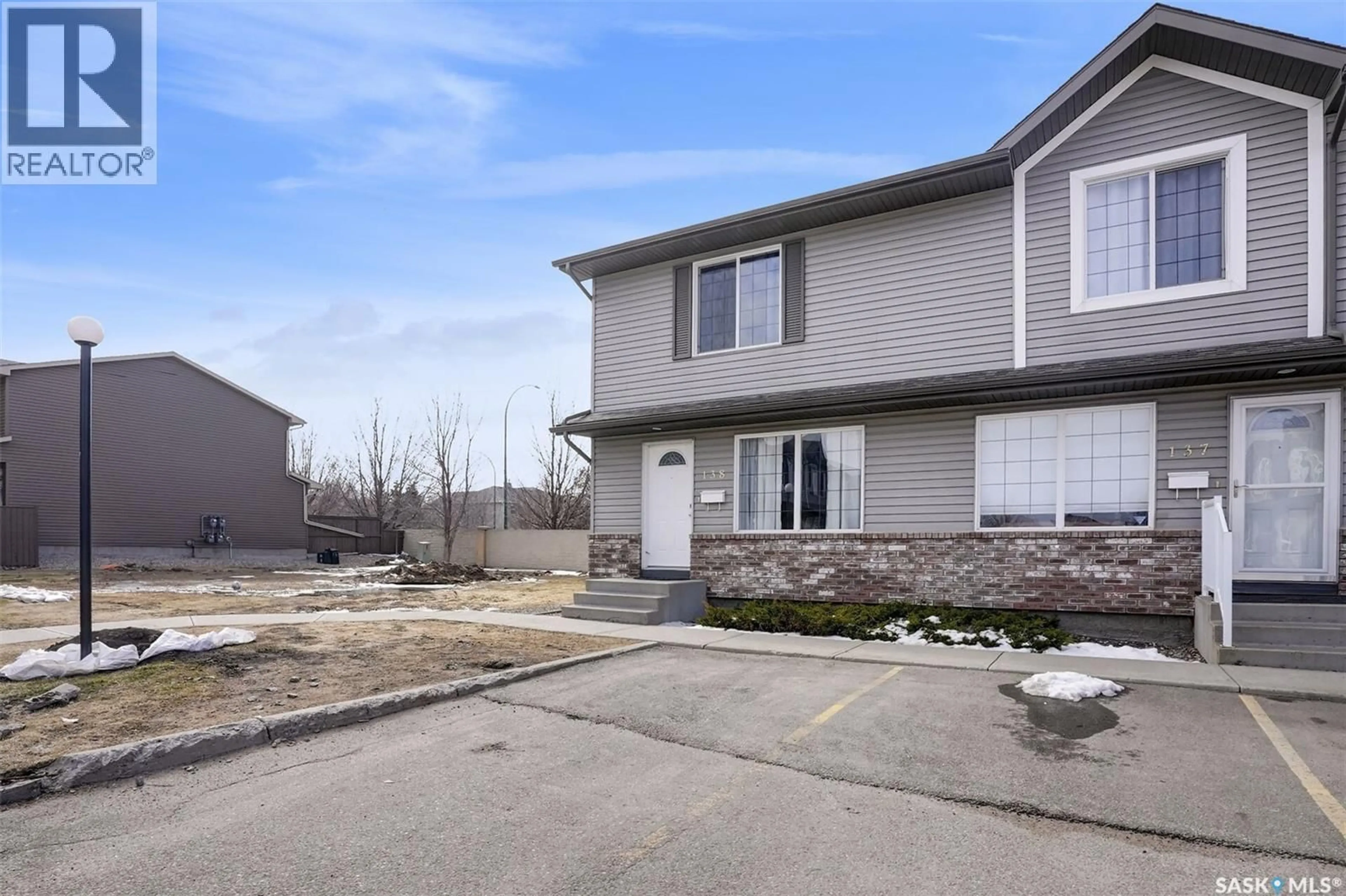 A pic from outside/outdoor area/front of a property/back of a property/a pic from drone, street for 138 - 4801 CHILD AVENUE, Regina Saskatchewan S4X0C4
