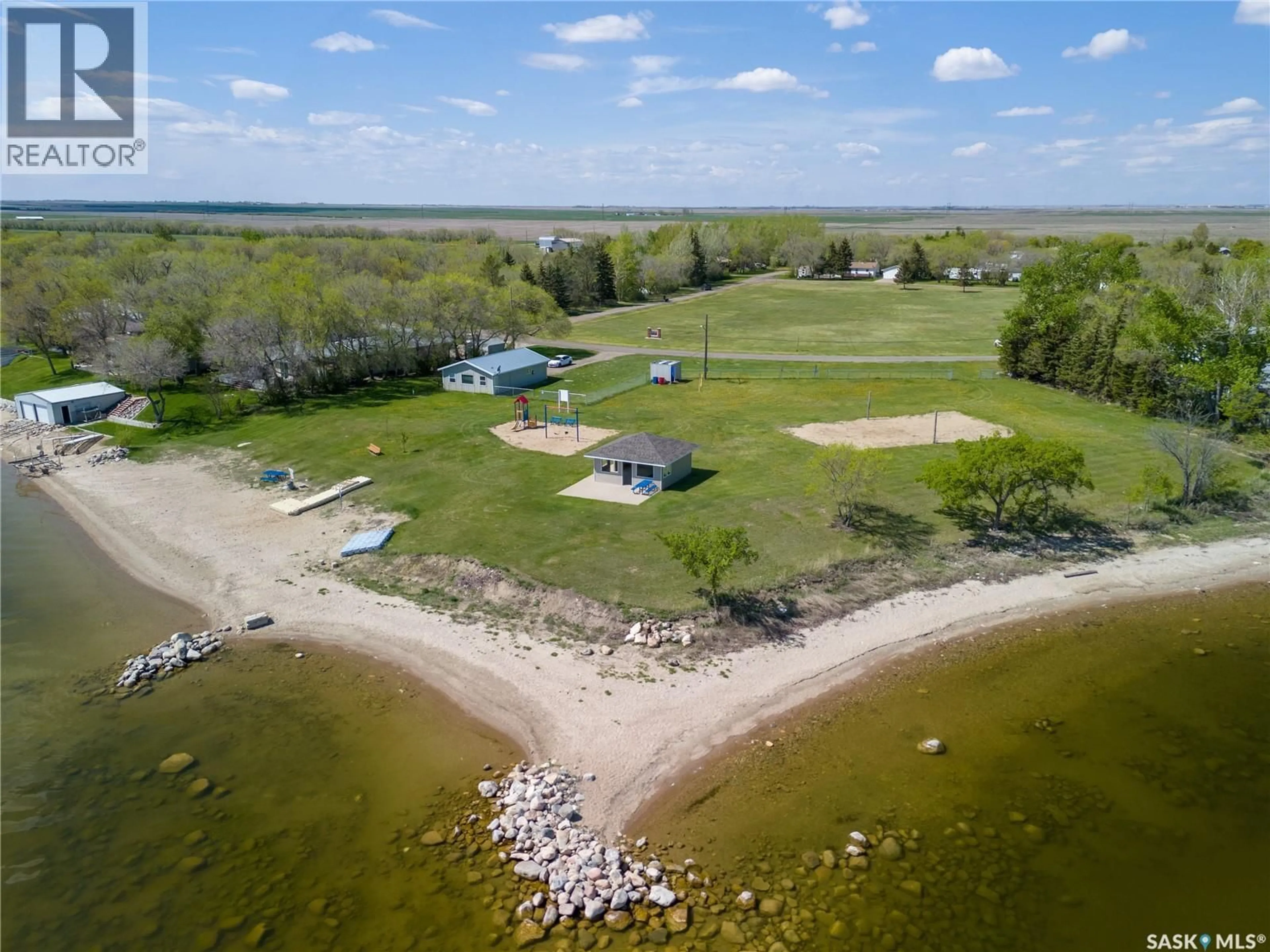 A pic from outside/outdoor area/front of a property/back of a property/a pic from drone, water/lake/river/ocean view for 237 AMY AVENUE, Alice Beach Saskatchewan S0G1C0