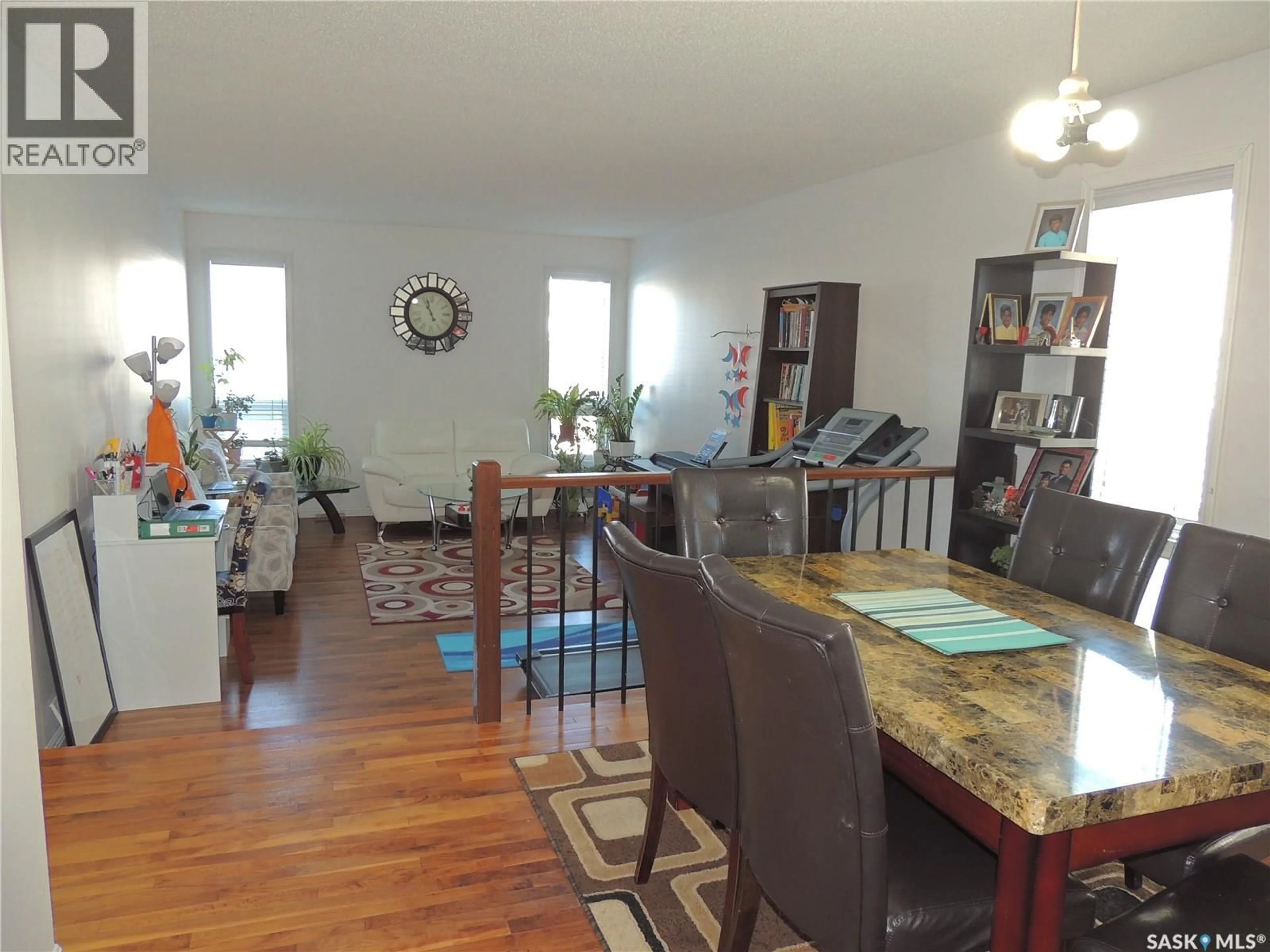 Dining room, wood/laminate floor for 421 MAPLE BAY, Estevan Saskatchewan S4A2E6