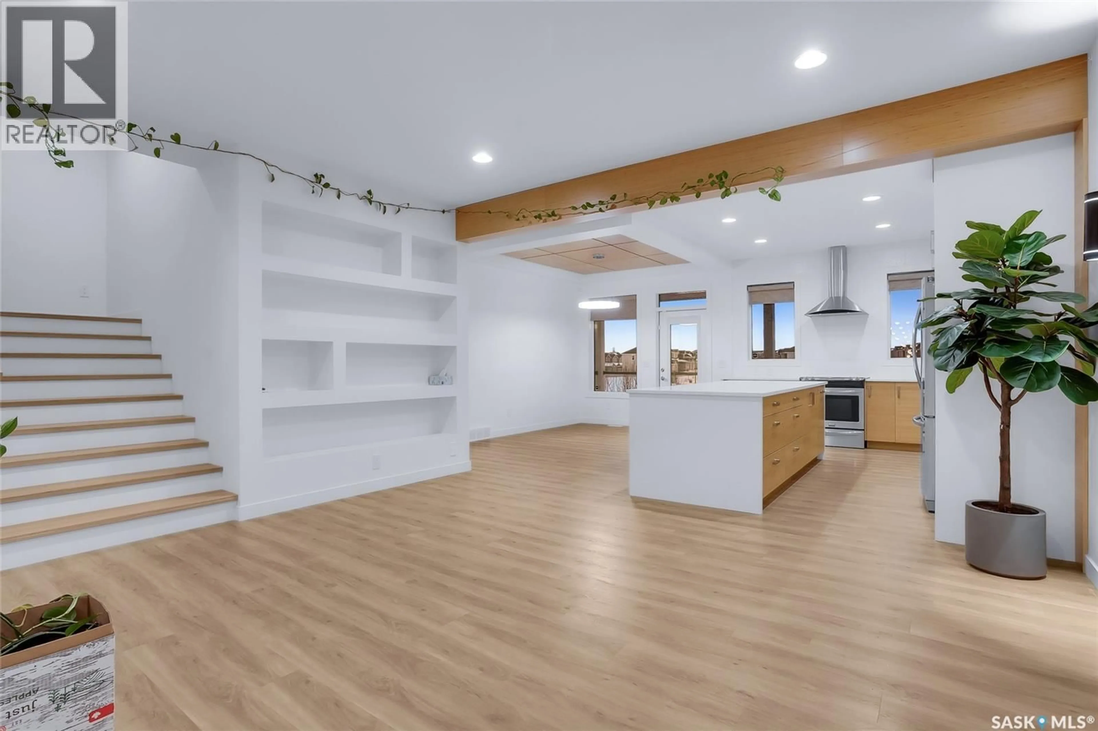 Open concept kitchen, wood/laminate floor for 230 GREYEYES-STEELE WAY, Saskatoon Saskatchewan S7V0M6